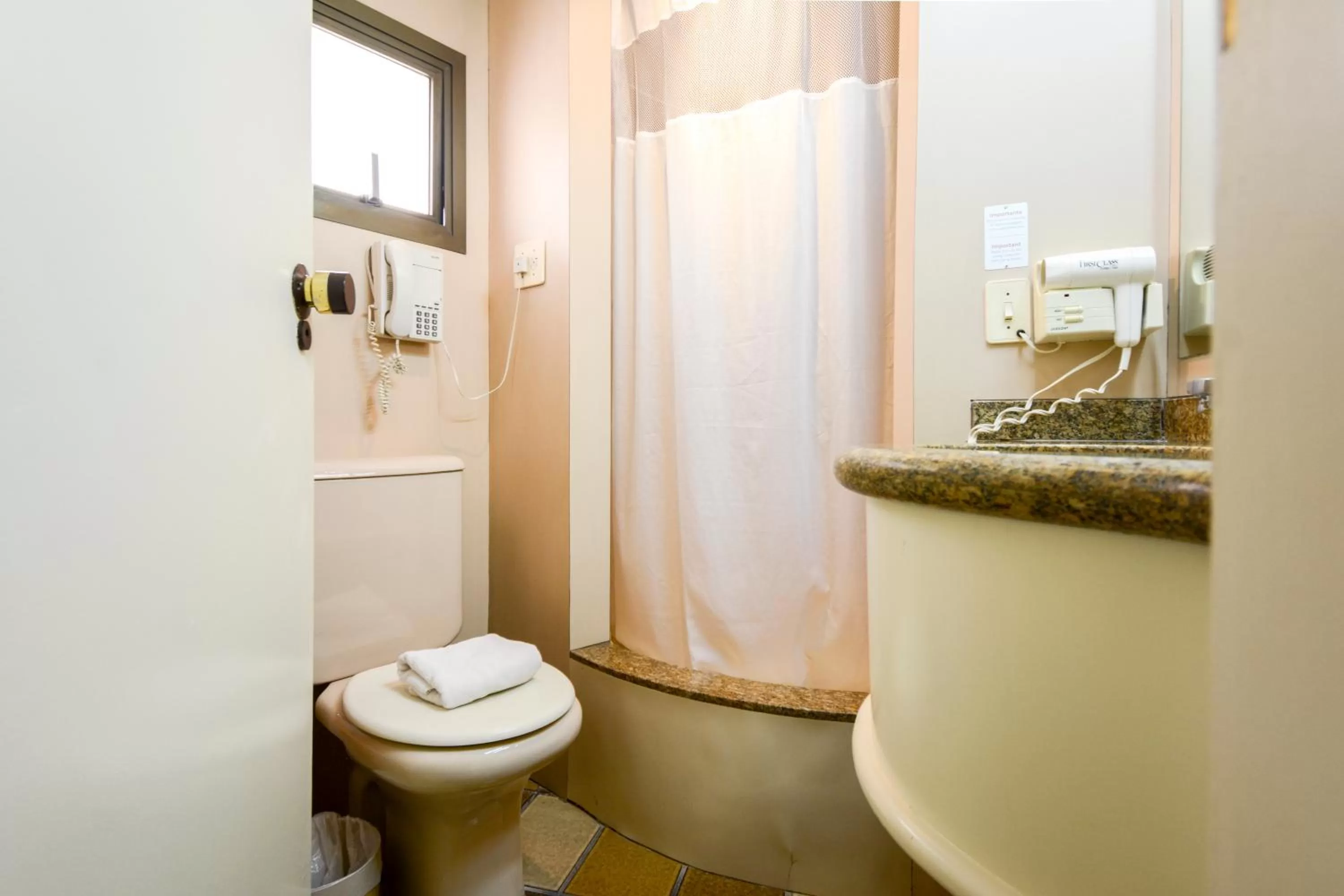 Bathroom in Wall Street Apartments by BnbHost