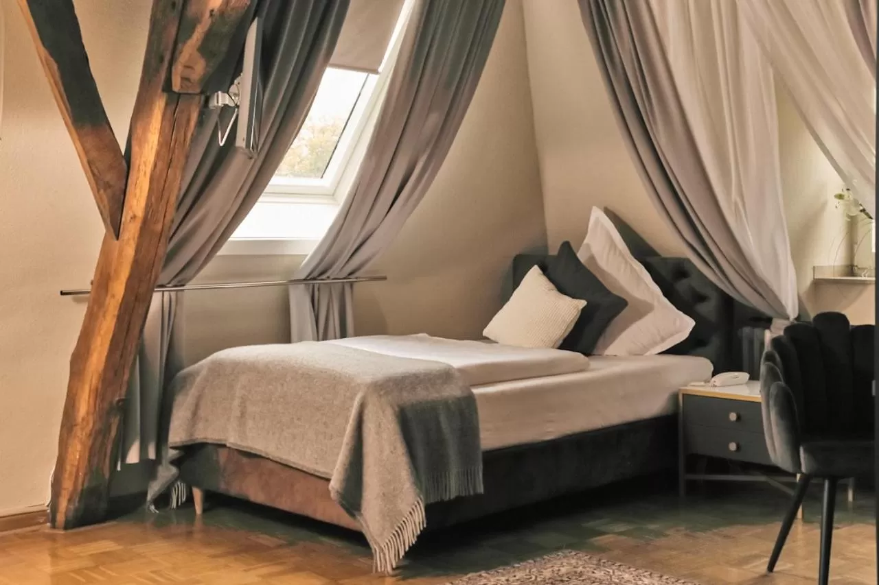 Photo of the whole room, Bed in Hotel van Bebber