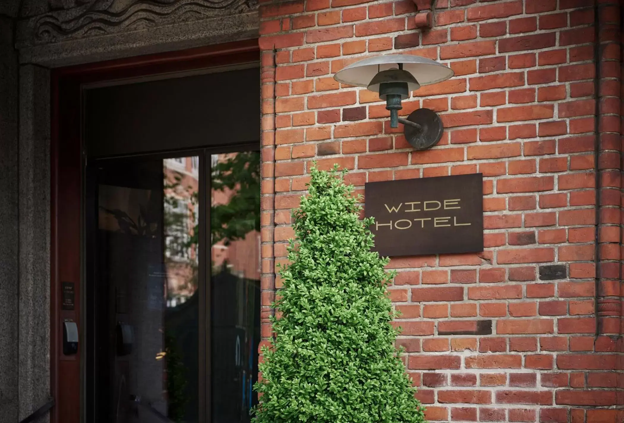 Facade/entrance in WIDE Hotel Facade/entrance in WIDE Hotel