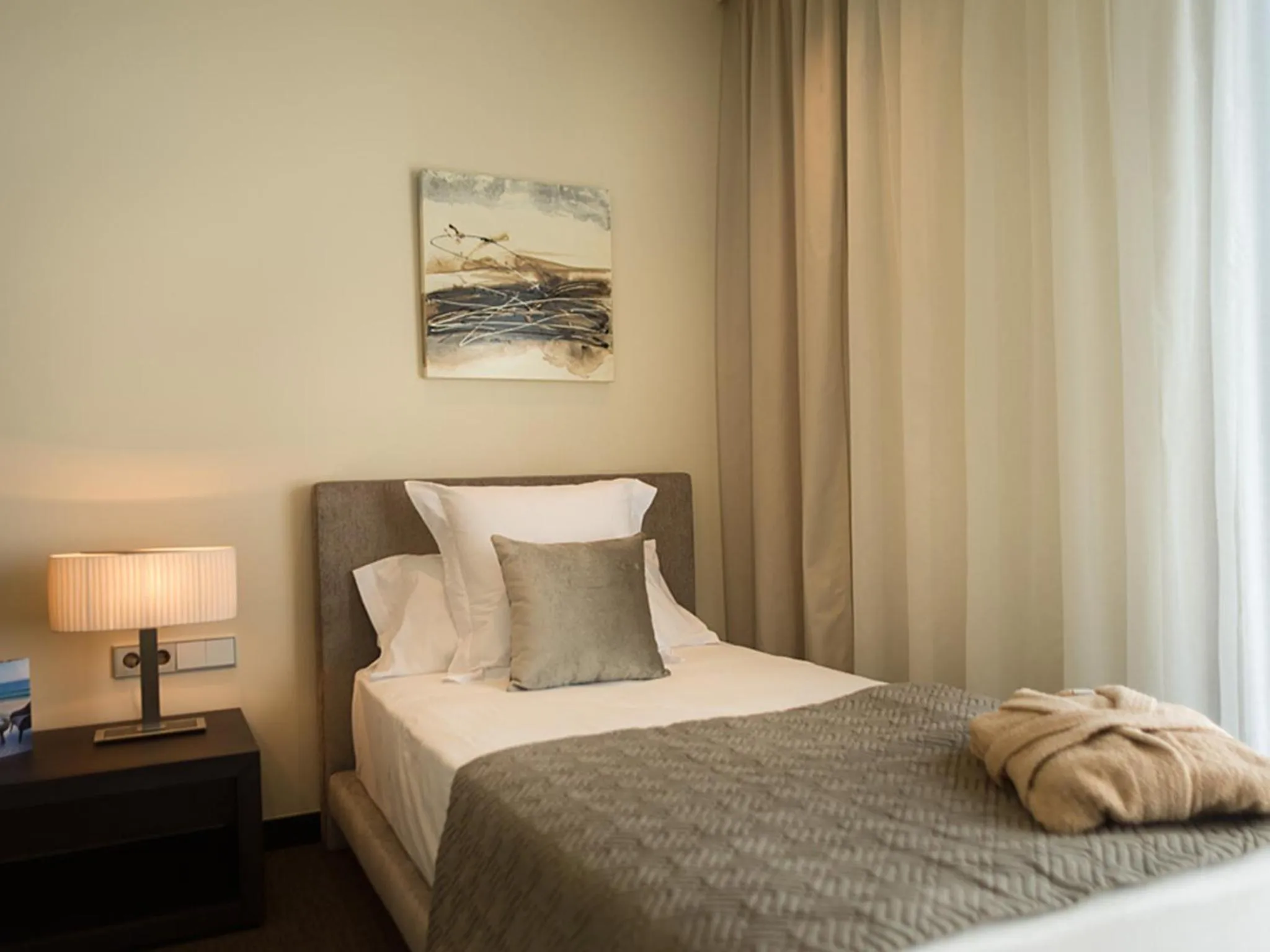 Bed in Cosmopolita Hotel Boutique & Spa