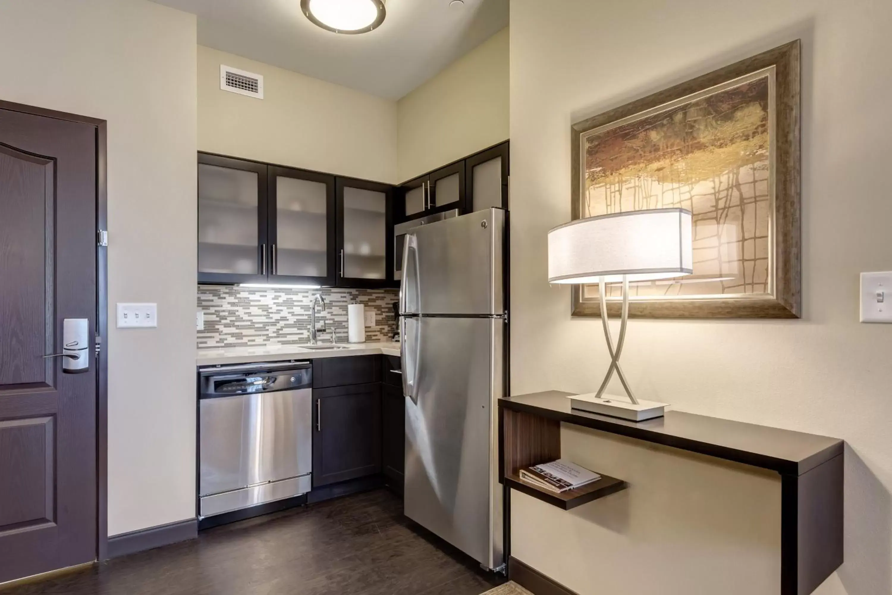 Photo of the whole room, Kitchen/Kitchenette in Staybridge Suites St Louis - Westport, an IHG hotel