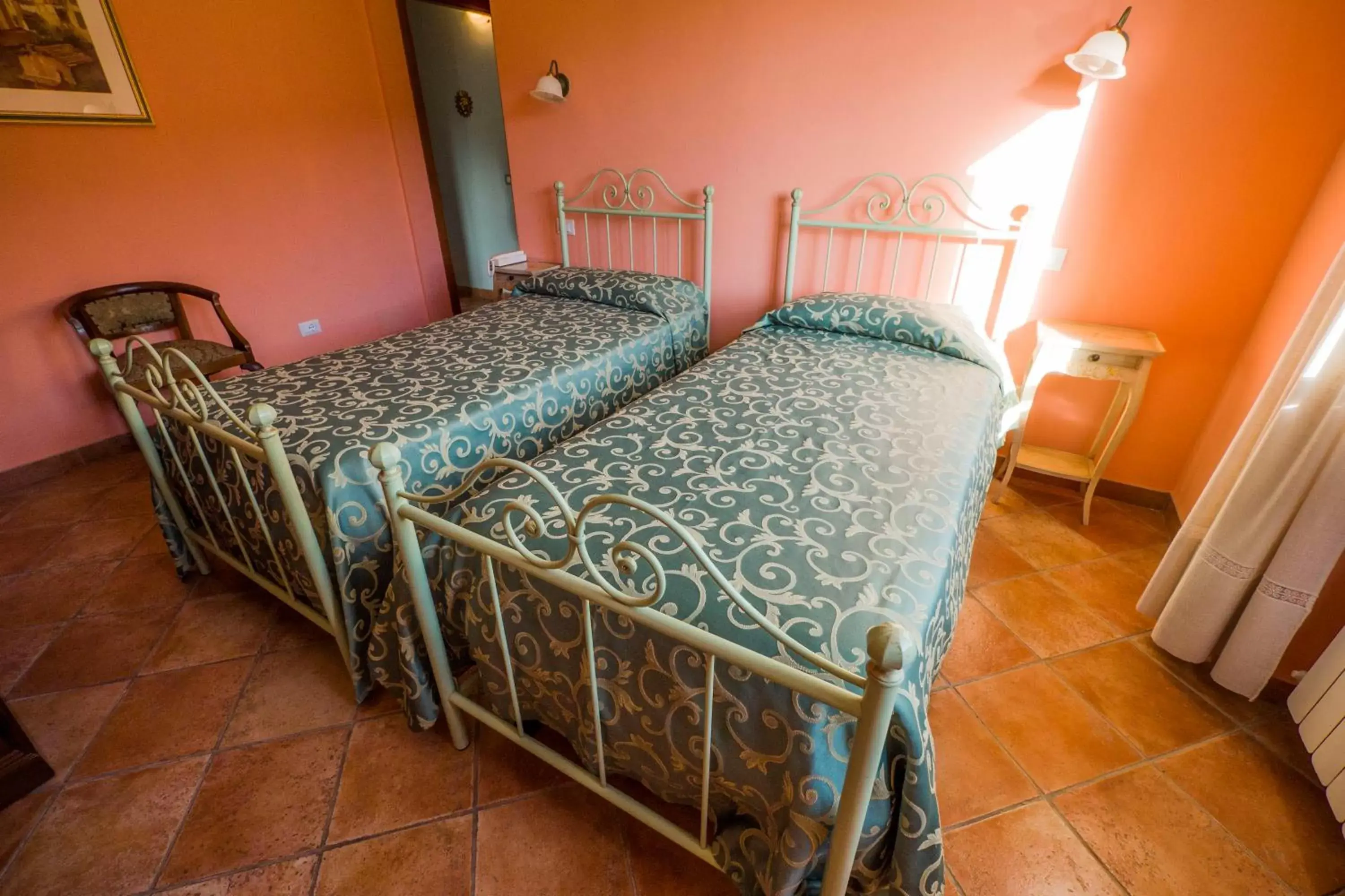 Bed in Albergo Il Sicomoro