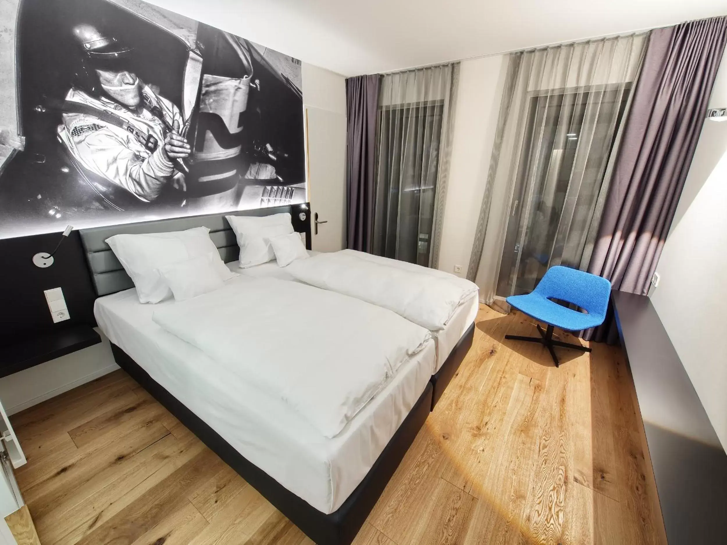 Photo of the whole room, Bed in V8 HOTEL Motorworld Region Stuttgart