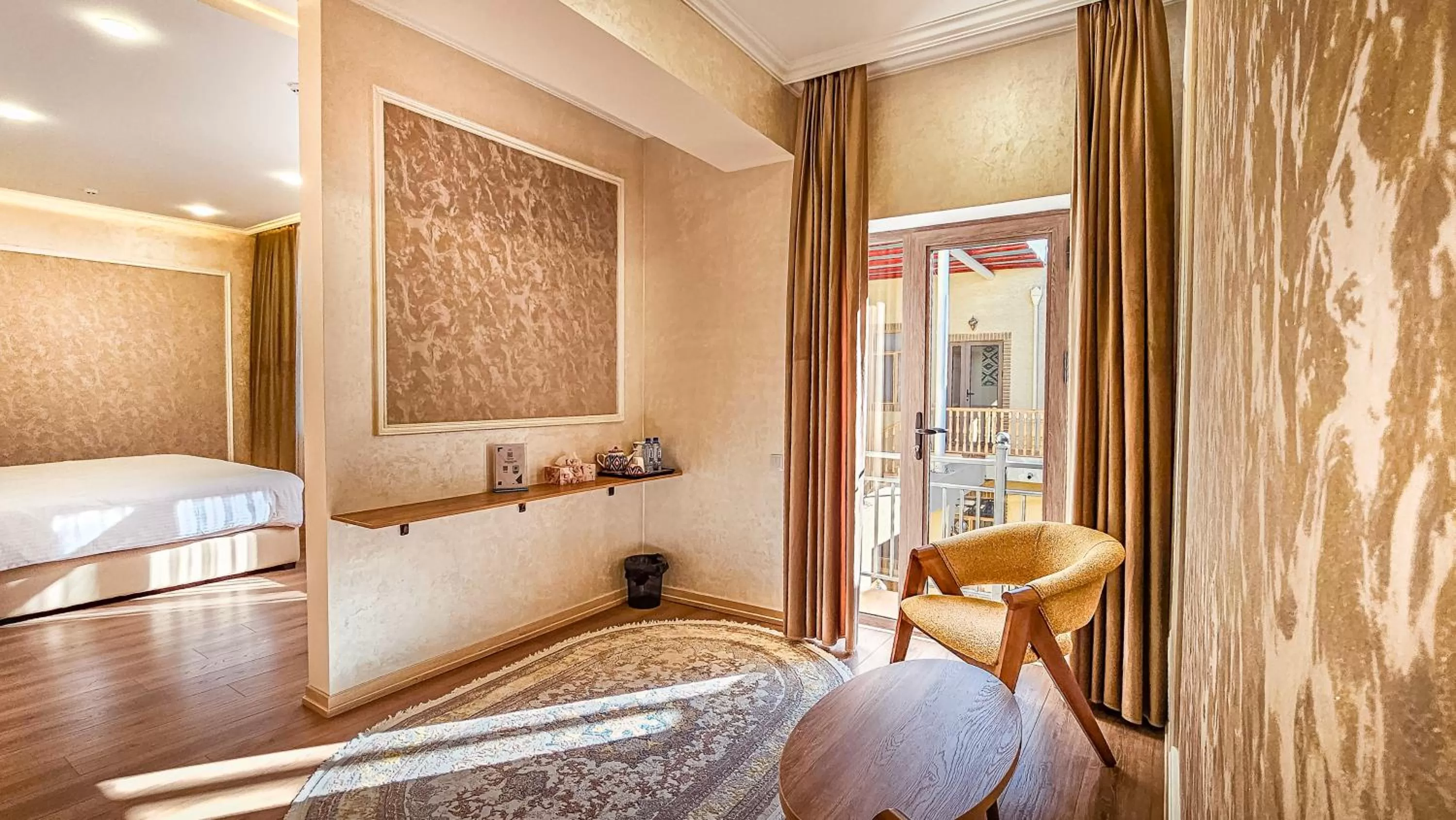 Living room, Bed in Hotel Bankir Khiva