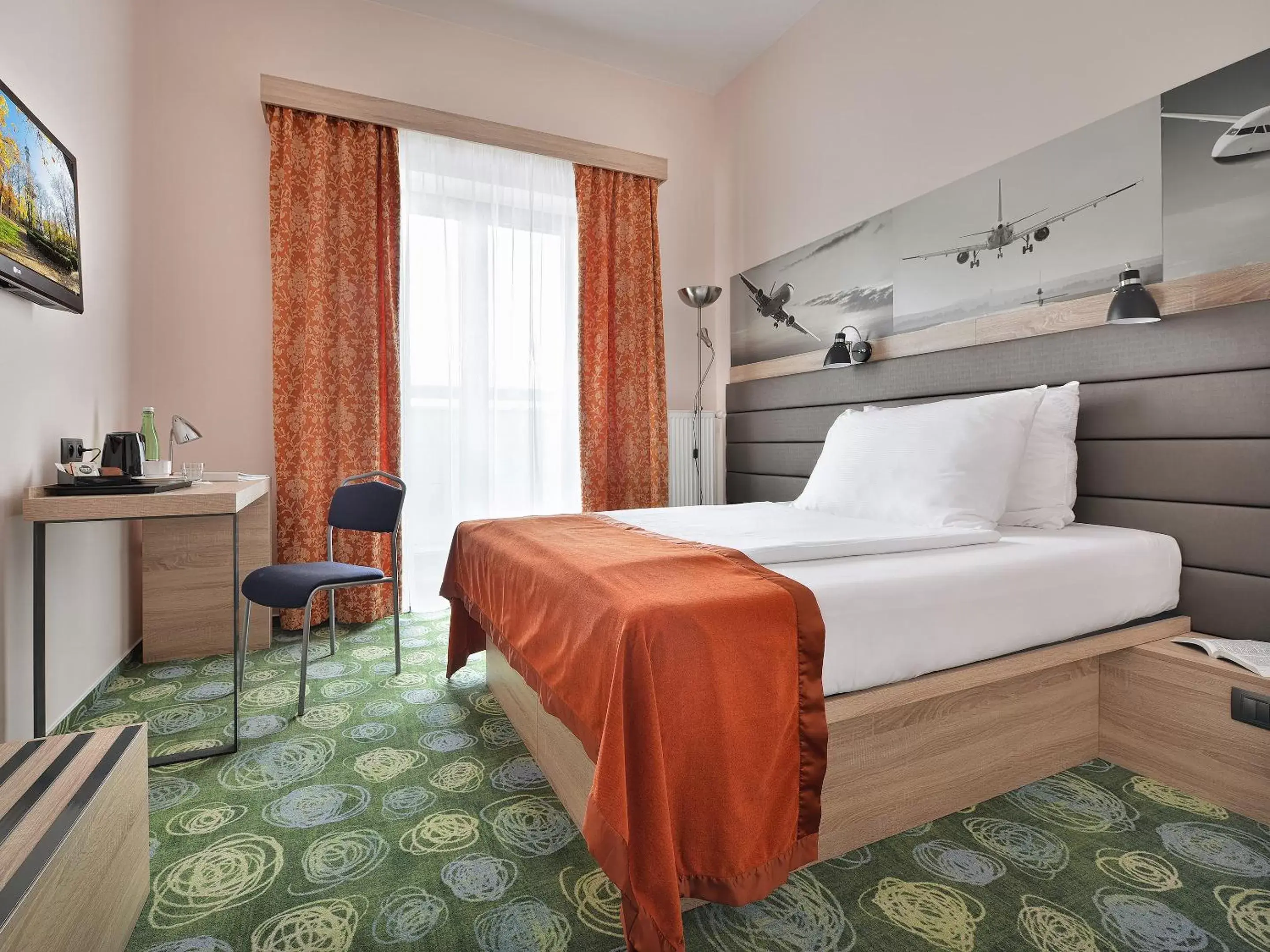 Bed in Ramada Airport Hotel Prague