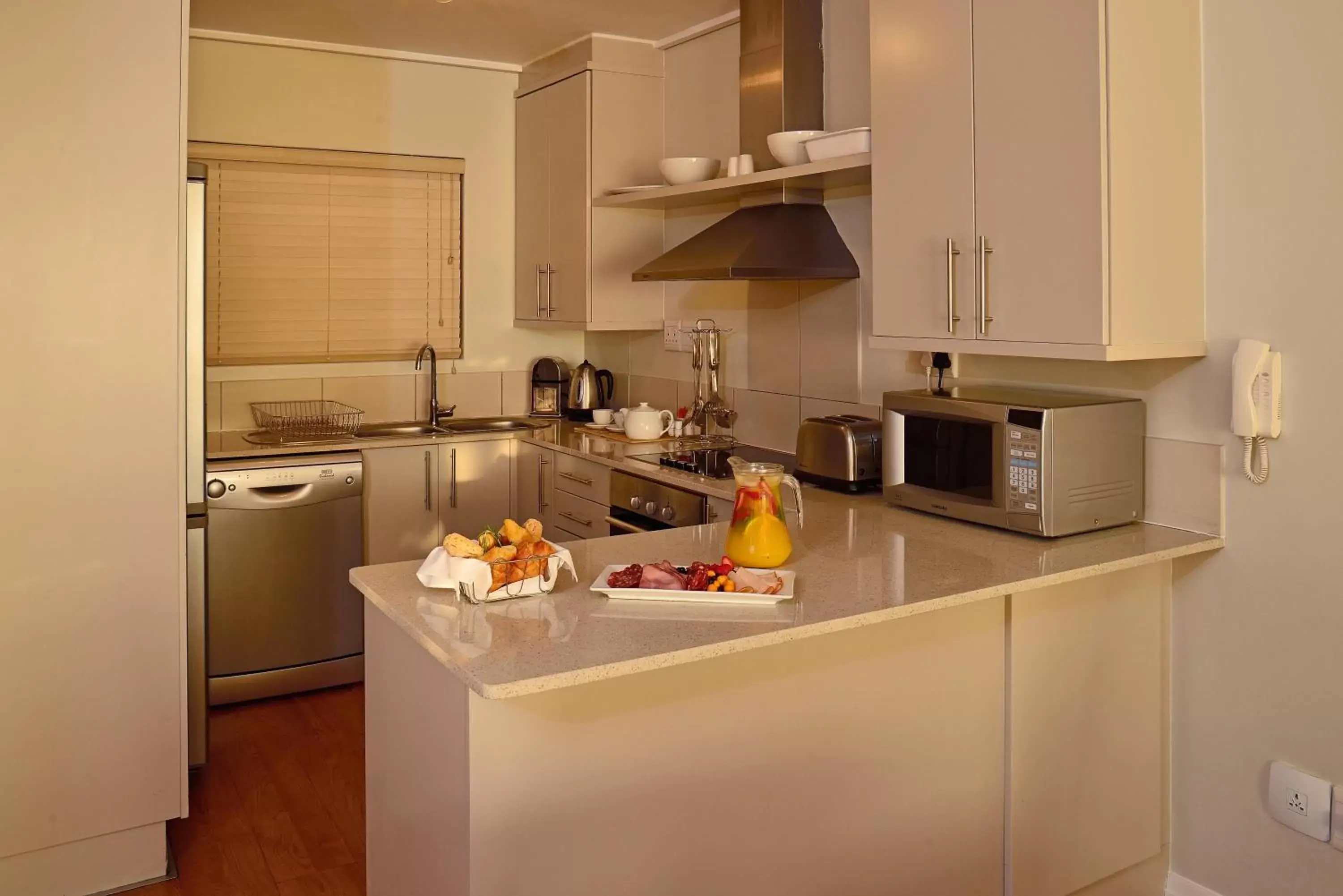 Kitchen or kitchenette, Kitchen/Kitchenette in Lagoon Beach Hotel & Spa