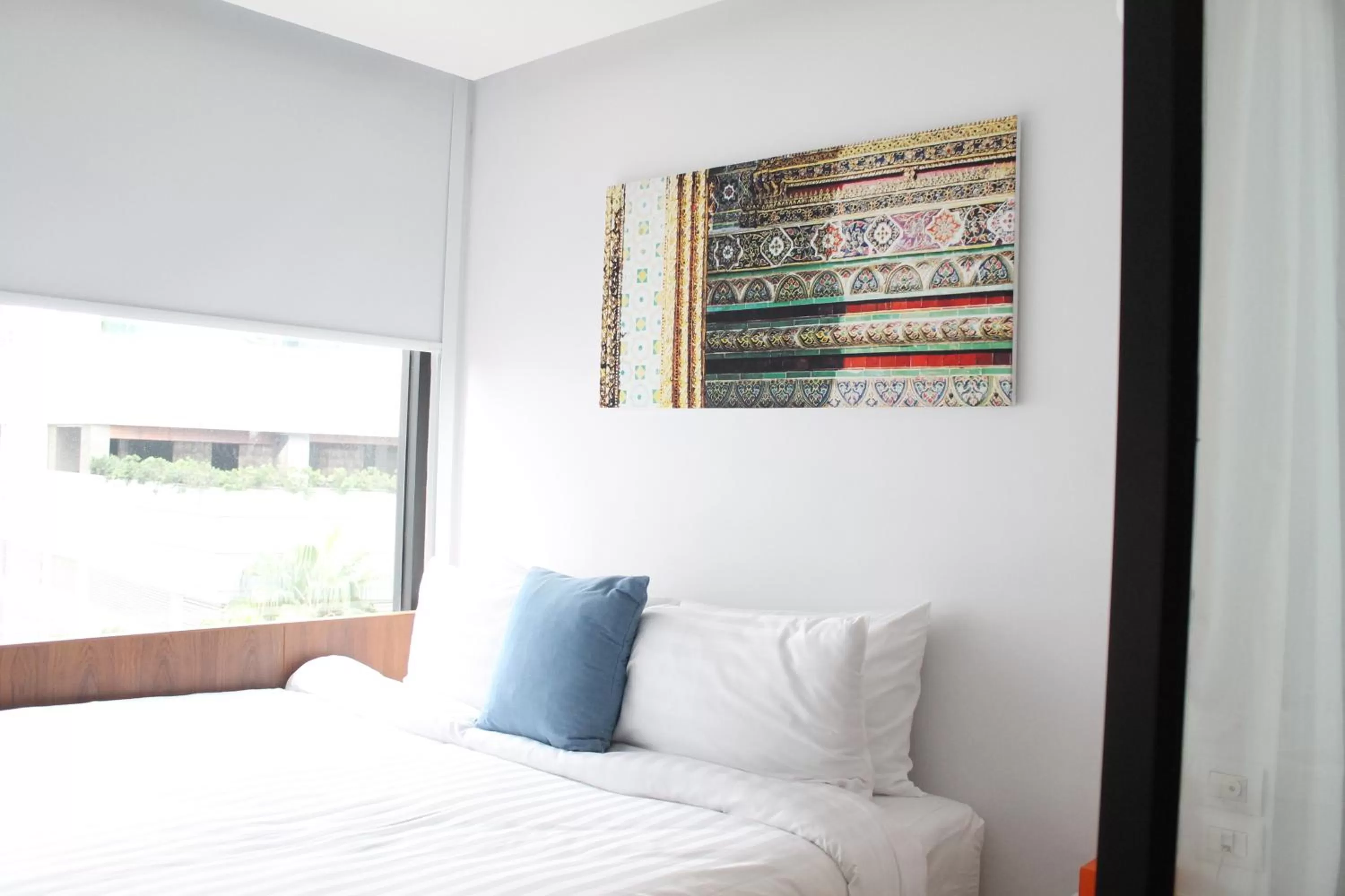 Bed in S Box Sukhumvit Hotel