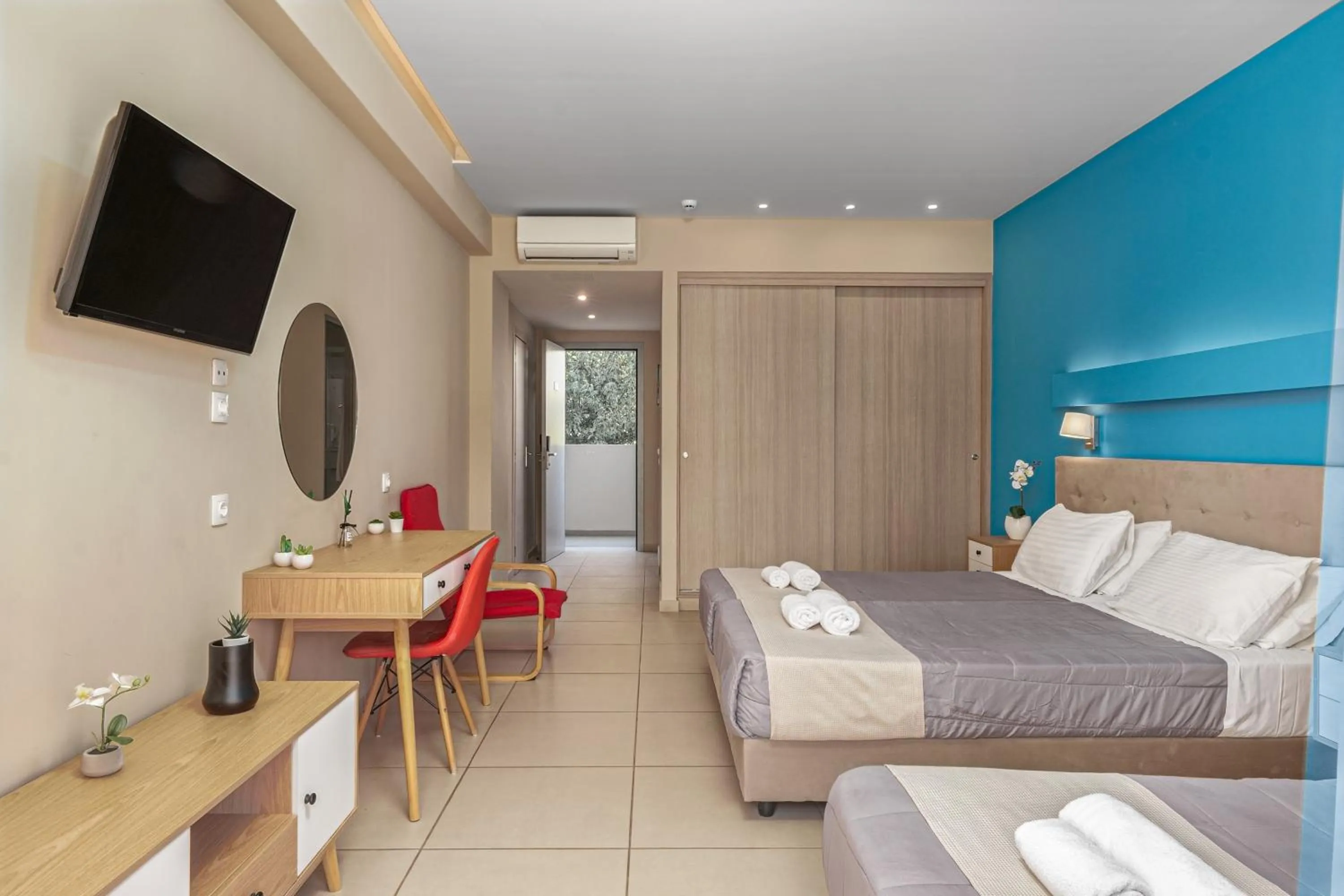 TV and multimedia, Bed in Poseidon Beach Hotel