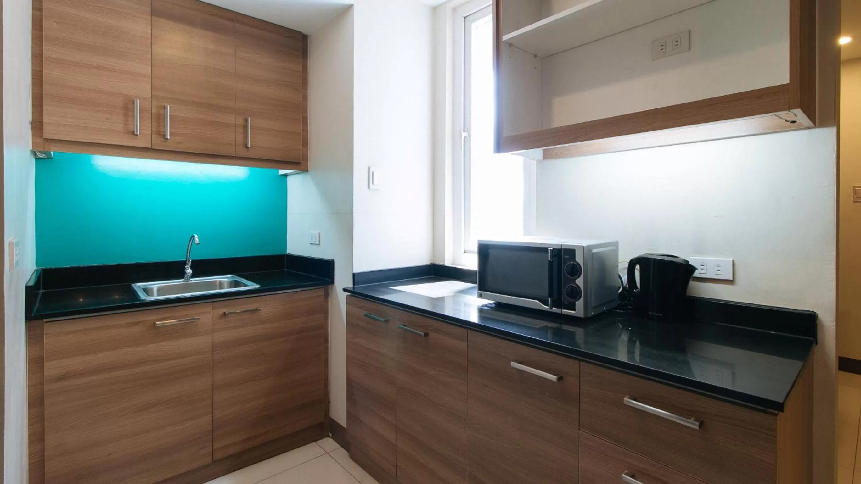 Kitchen or kitchenette in RedDoorz Plus at Kamuning Quezon City