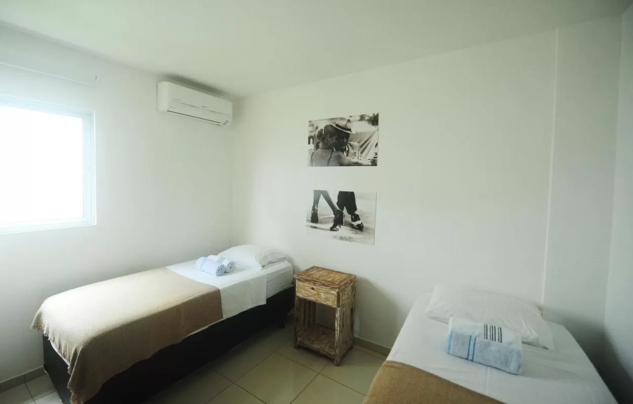 Bed in Manga Verde Beach Residence