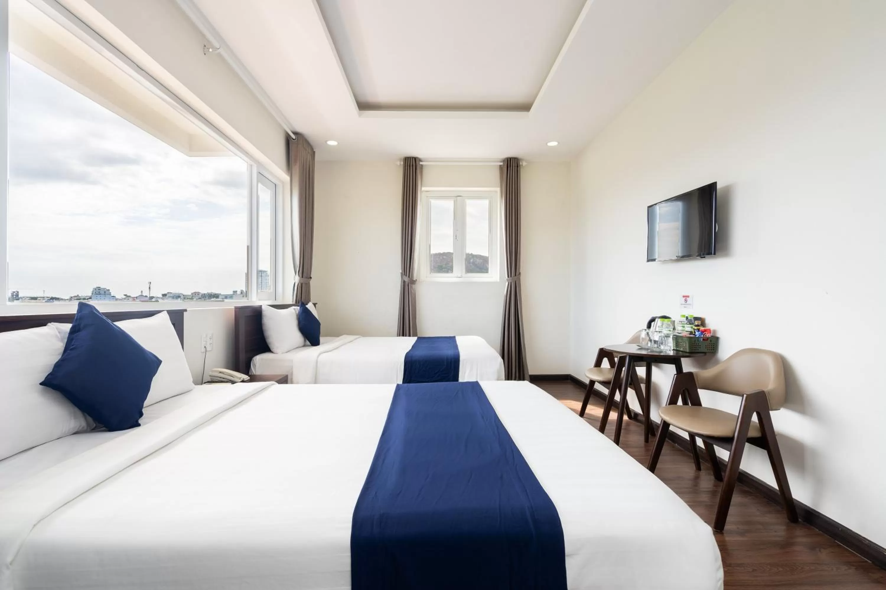 Bed in Central Hotel by Joi Hospitality