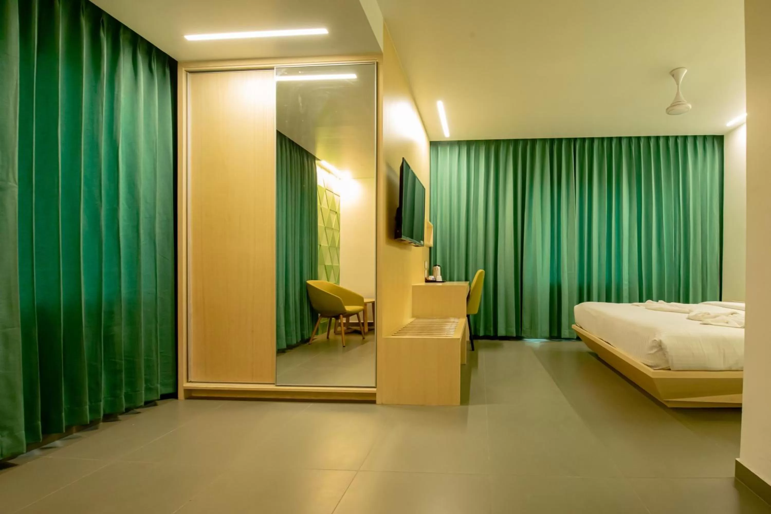 Living room, Bed in RATHNA RESIDENCY - Near US CONSULATE