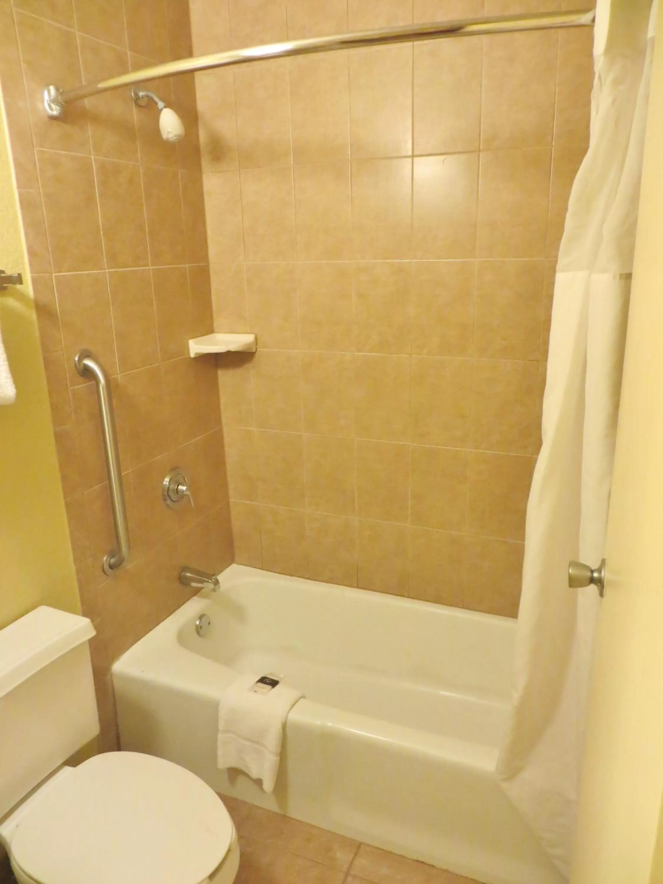 Bathroom in Days Inn by Wyndham Orlando Airport Florida Mall
