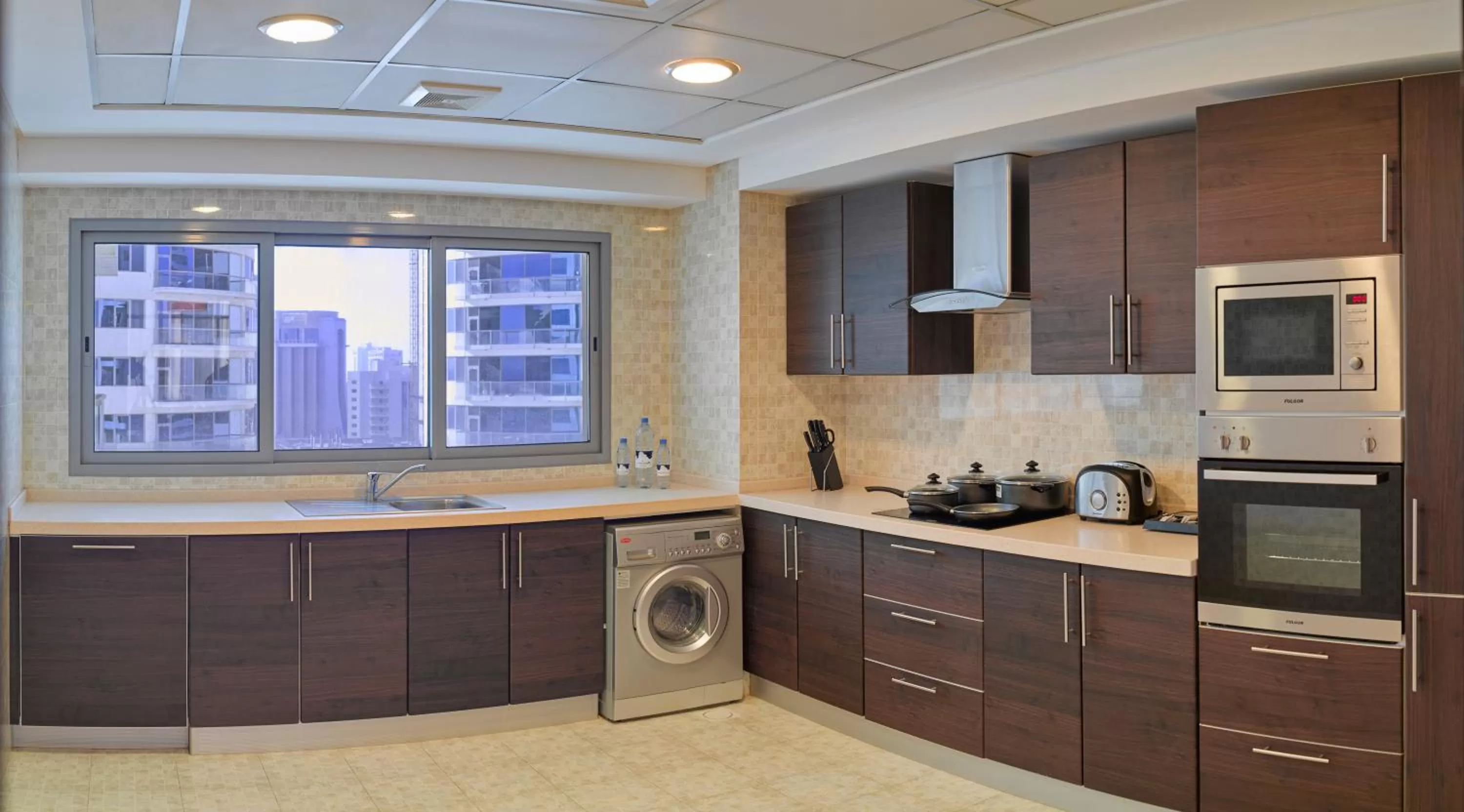 Kitchen or kitchenette in Tulip Hotel & Suites