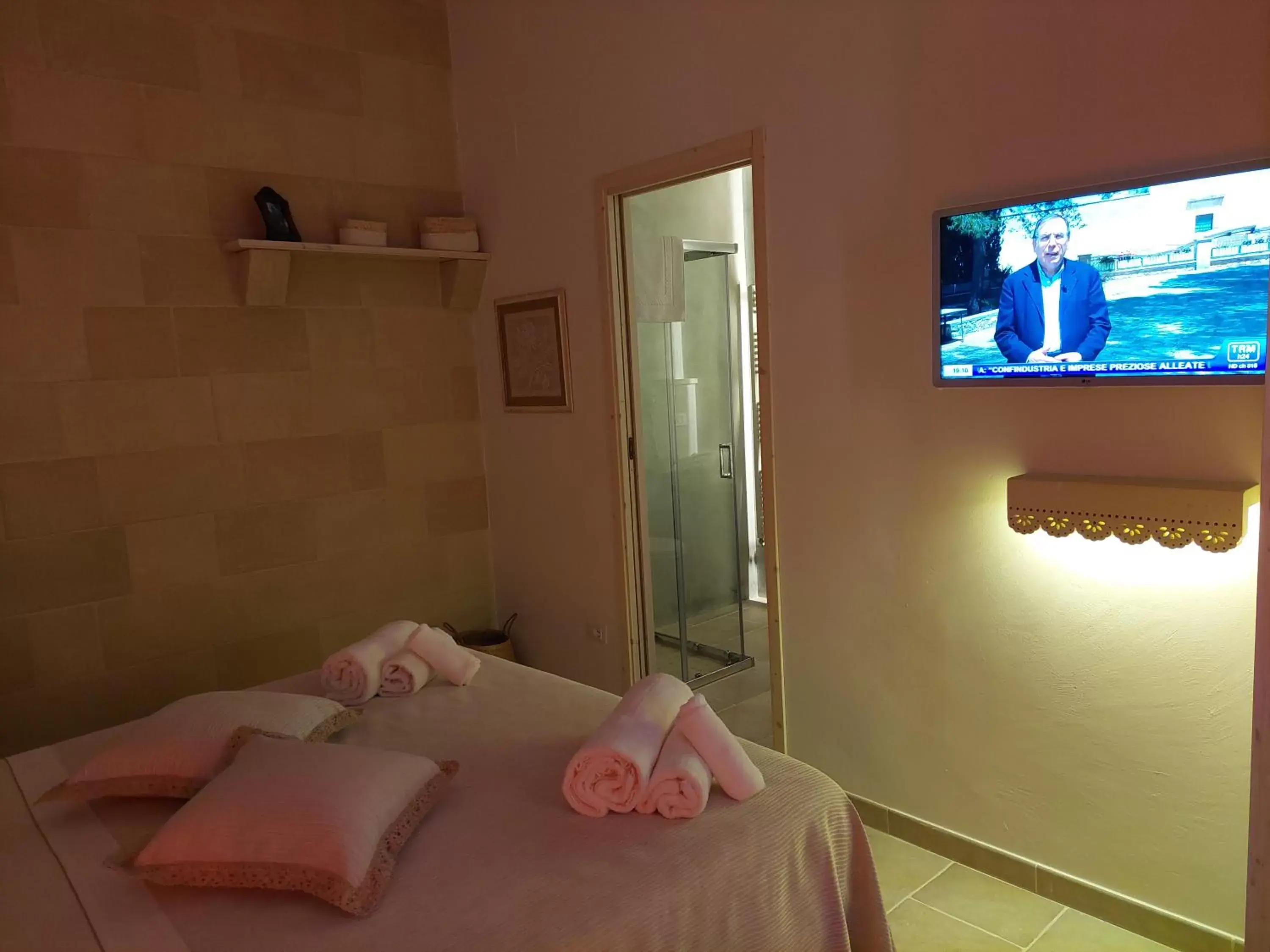 Bed, TV/Entertainment Center in Dimora Assuntina Martano