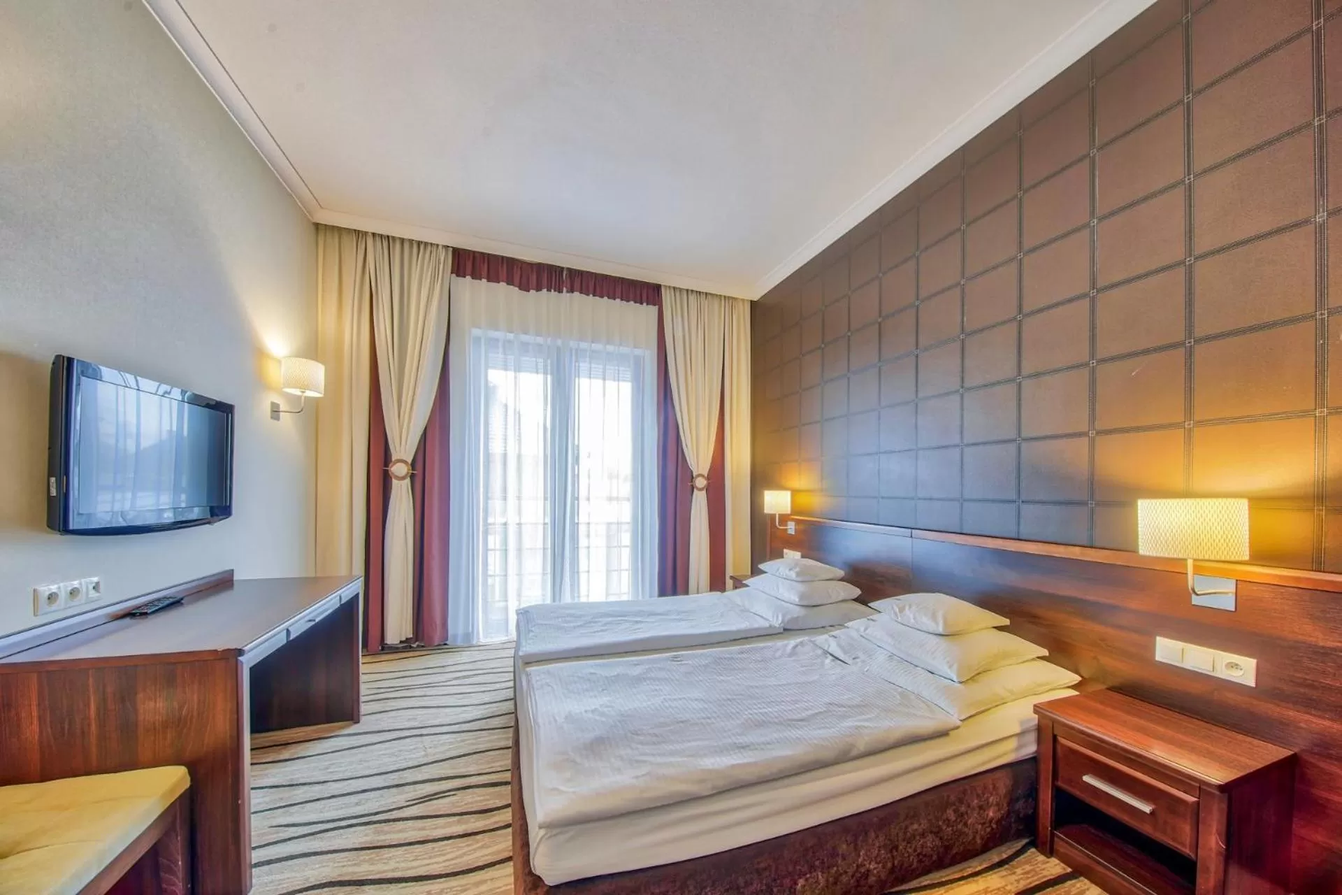 Bed in Hotel Arkas