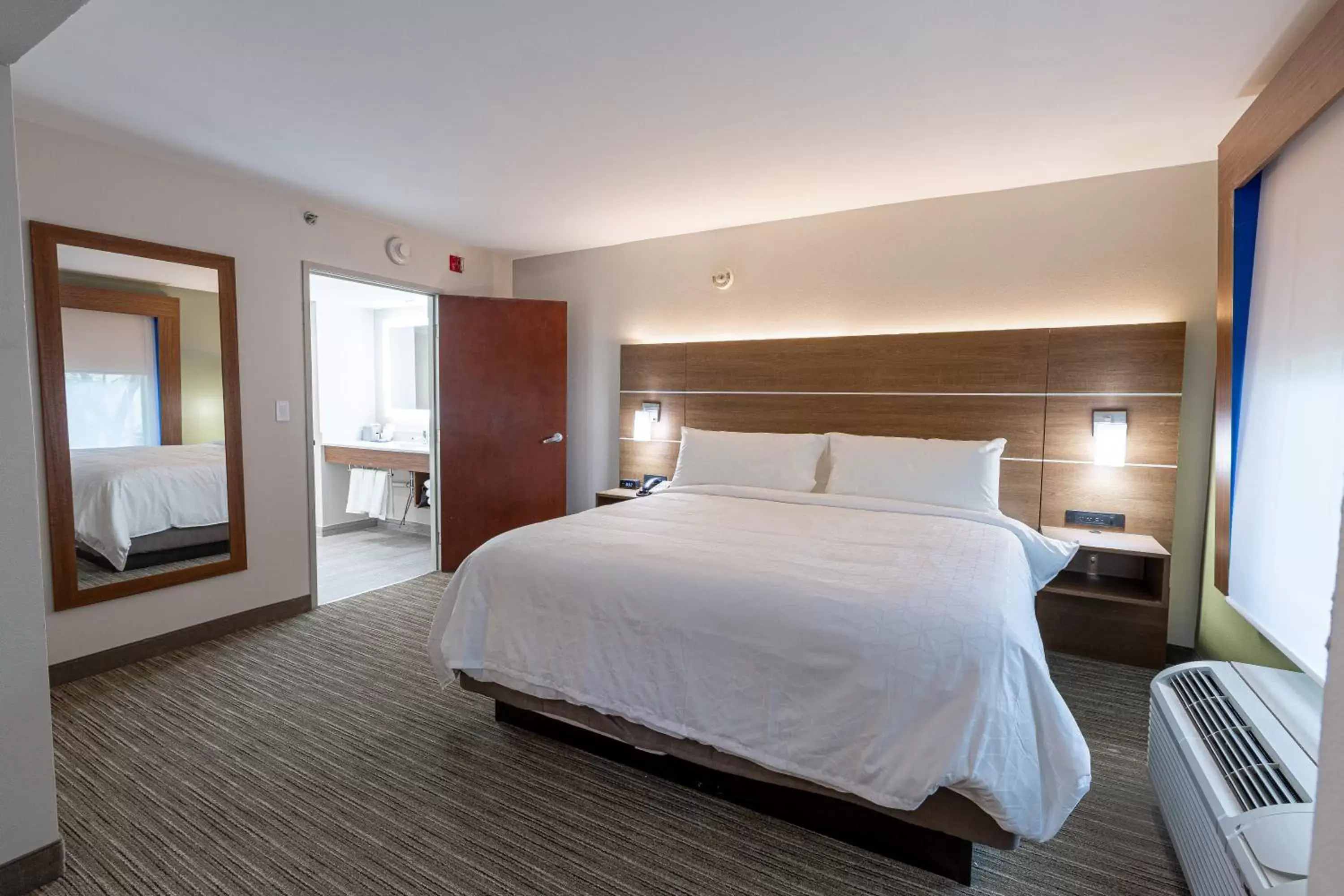 Bedroom, Bed in Holiday Inn Express & Suites Arlington North – Stadium Area, an IHG Hotel