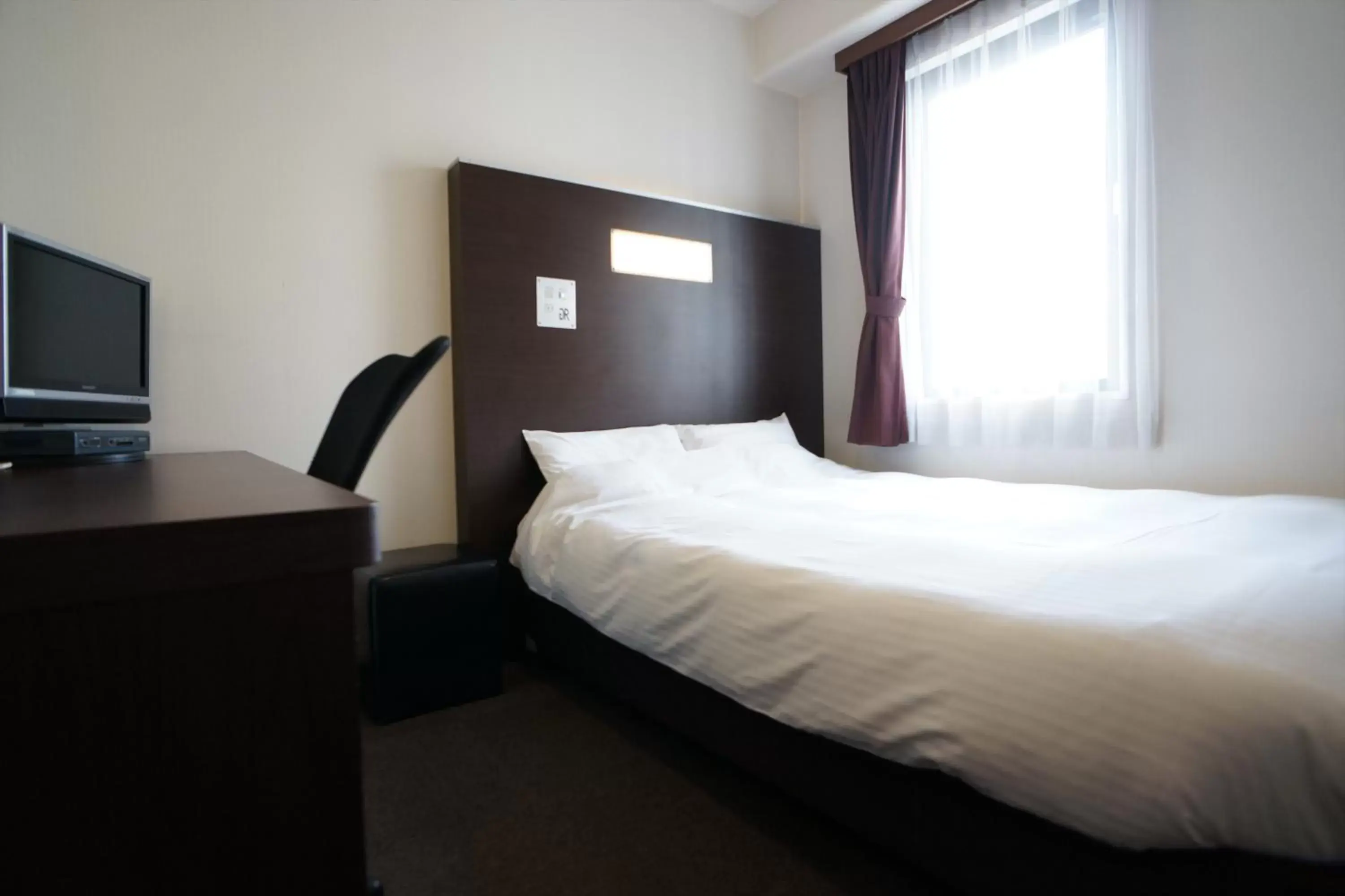 Photo of the whole room, Bed in Green Rich Hotel Hiroshima Shinkansenguchi (Artificial hot spring Futamata Yunohana)