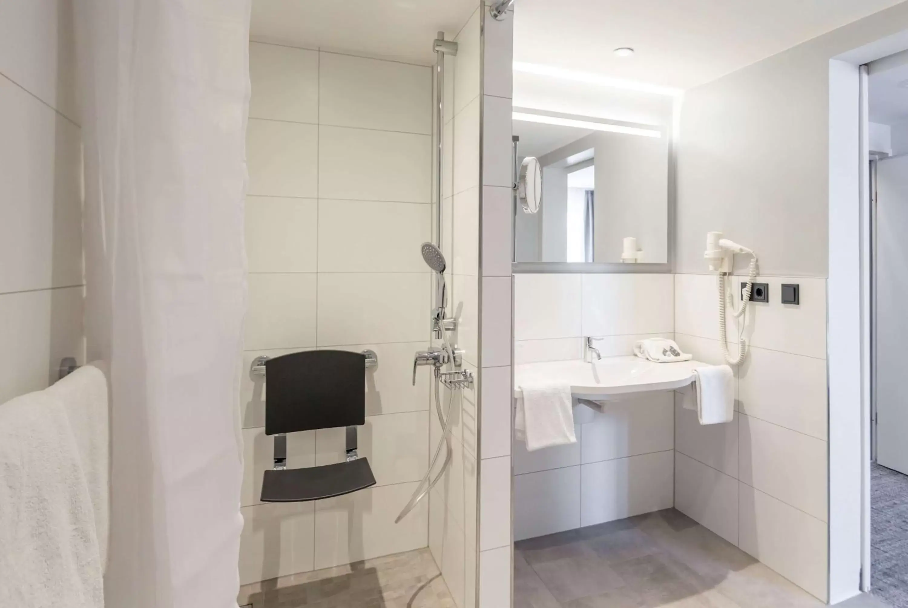 Photo of the whole room, Bathroom in Ramada by Wyndham Flensburg