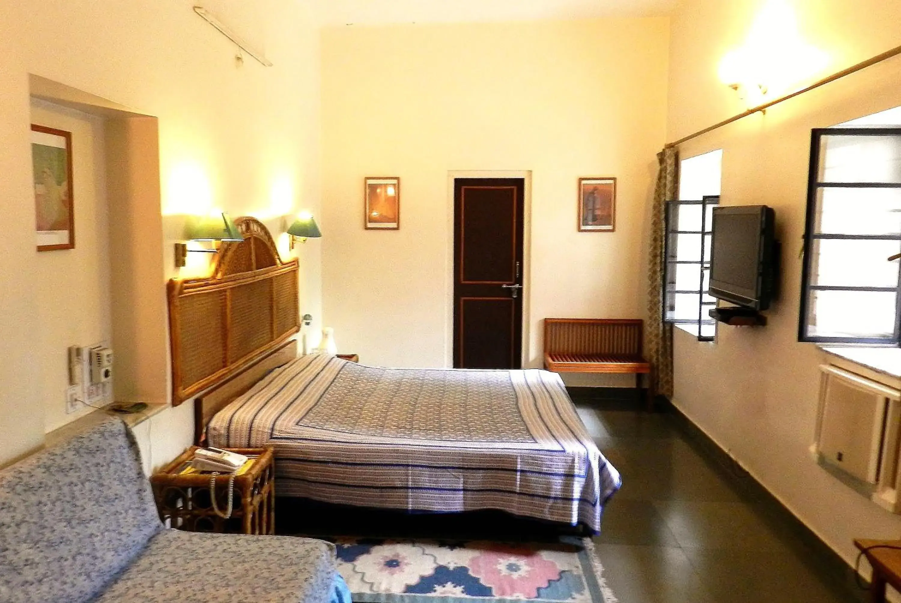 Photo of the whole room, Bed in Jai Niwas Garden Hotel