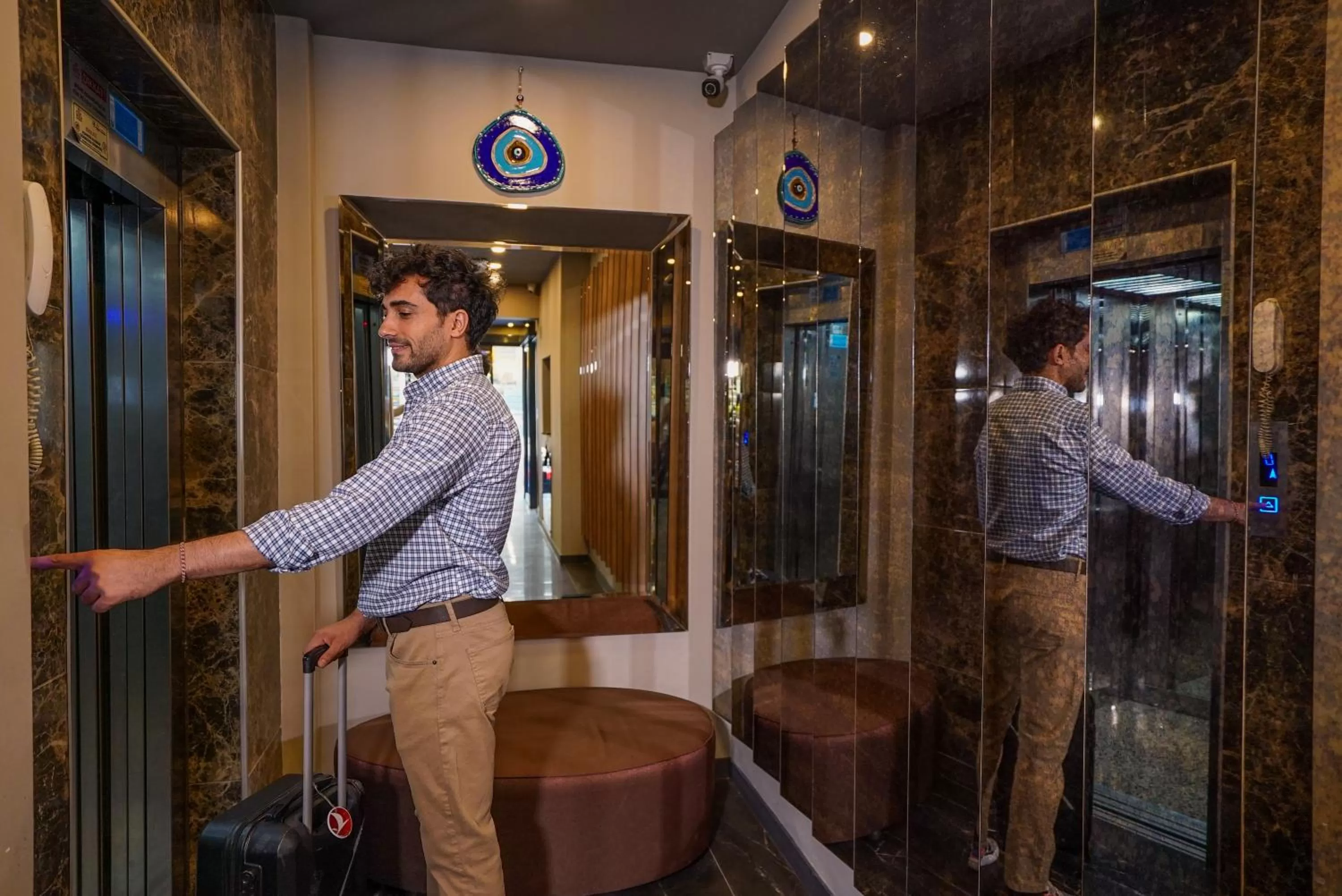 elevator in Homey AirPort Hotel