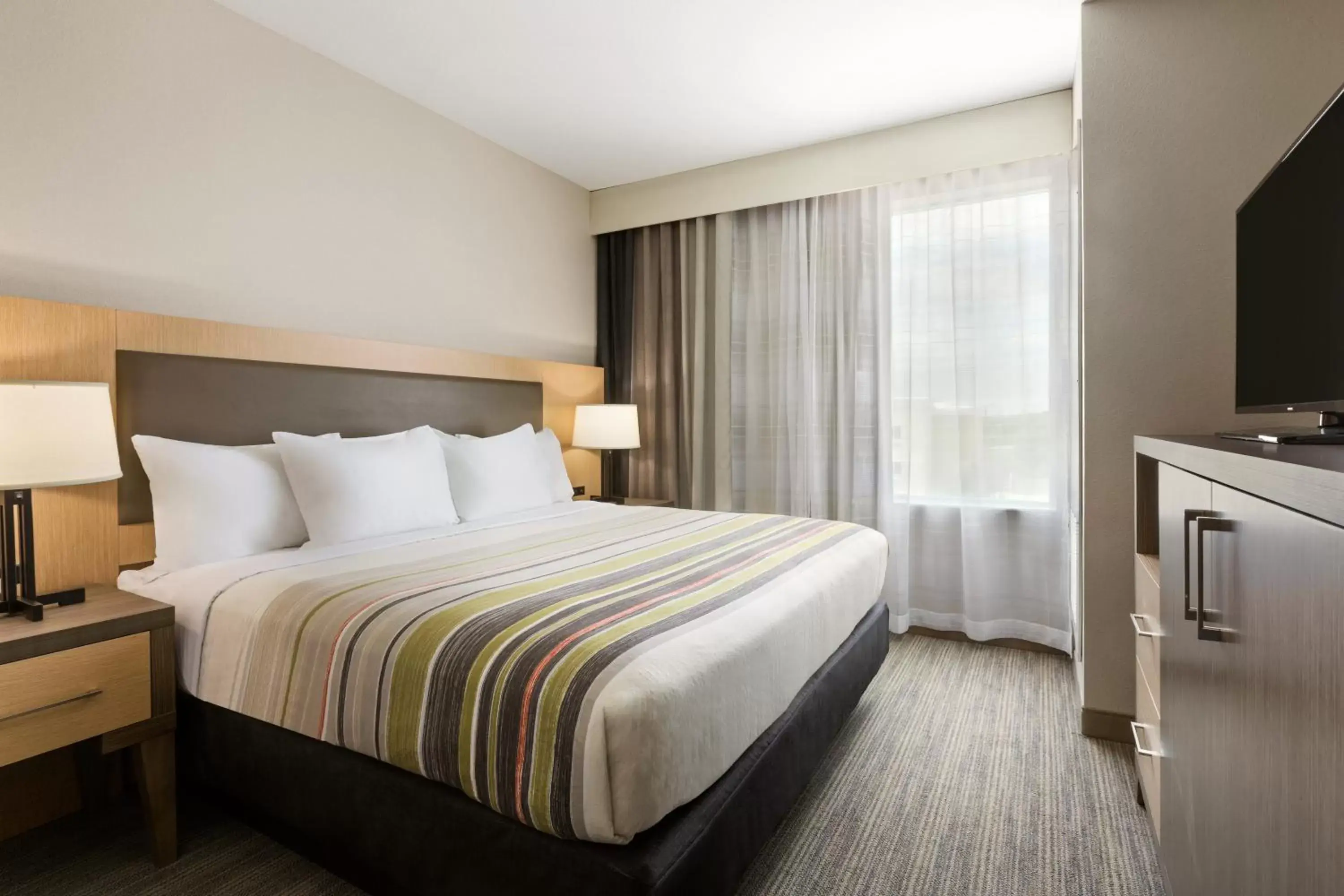 Bedroom, Bed in Country Inn & Suites by Radisson, New Braunfels, TX