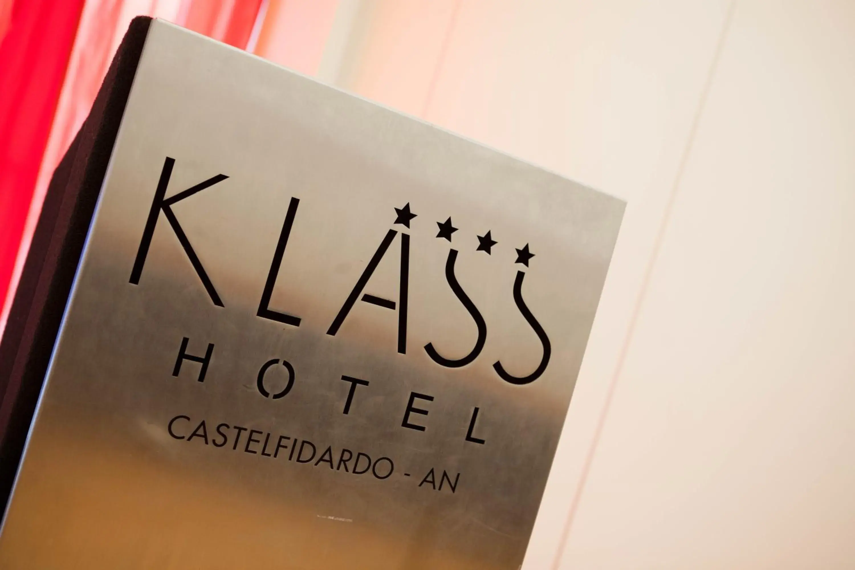 Property logo or sign in Klass Hotel