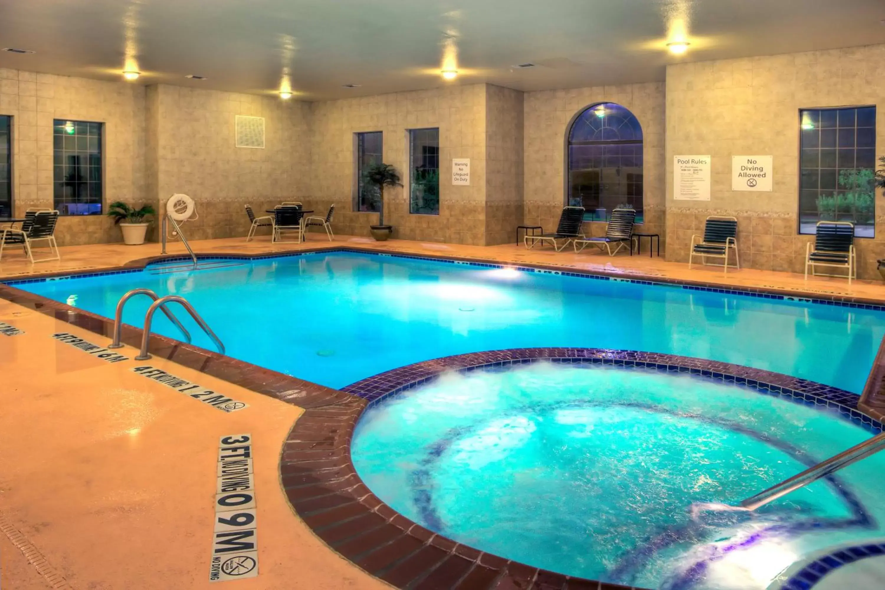 Swimming Pool in Holiday Inn Express and Suites Granbury, an IHG Hotel