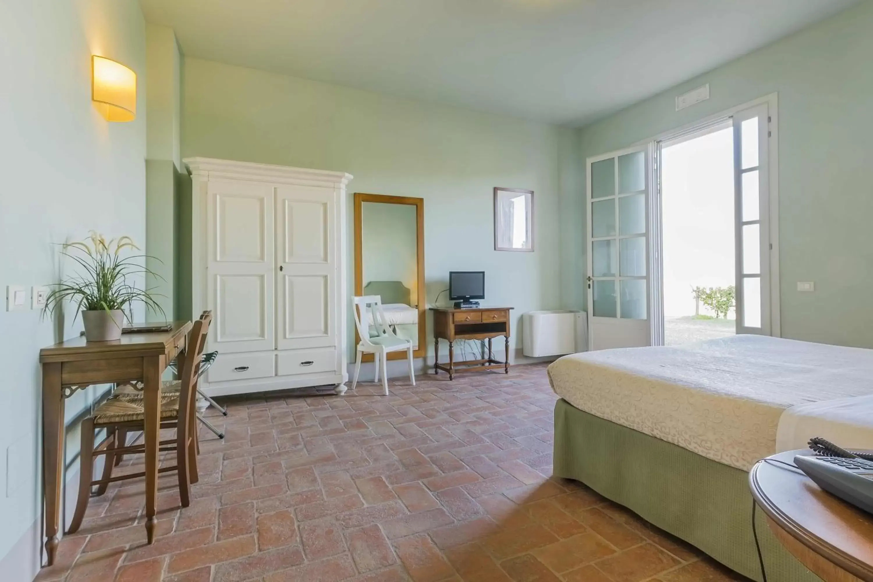 Bedroom in Le Sodole Country Resort & Golf