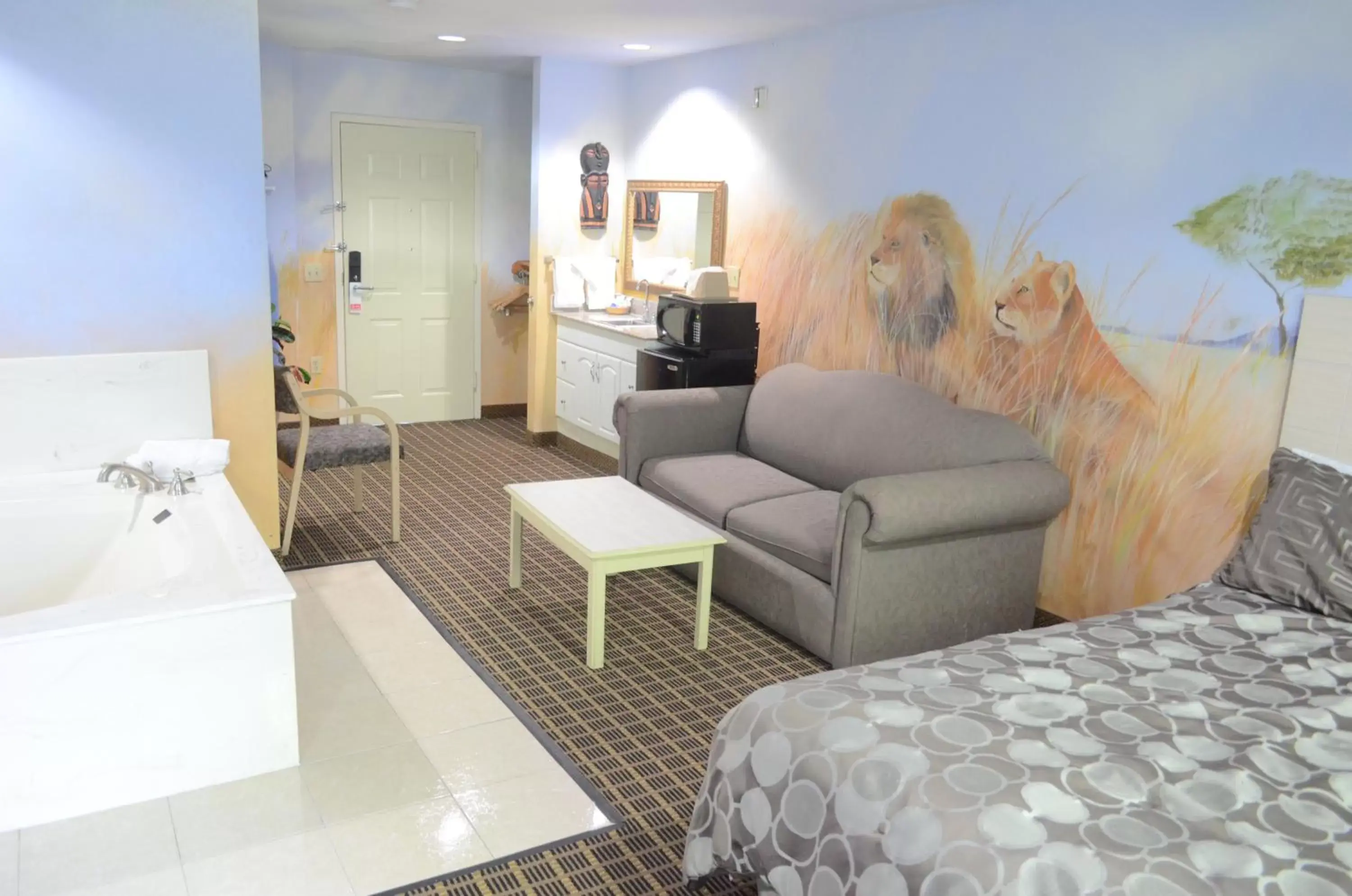 Bedroom, Seating Area in Scottish Inn and Suites NRG Park/Texas Medical Center - Houston