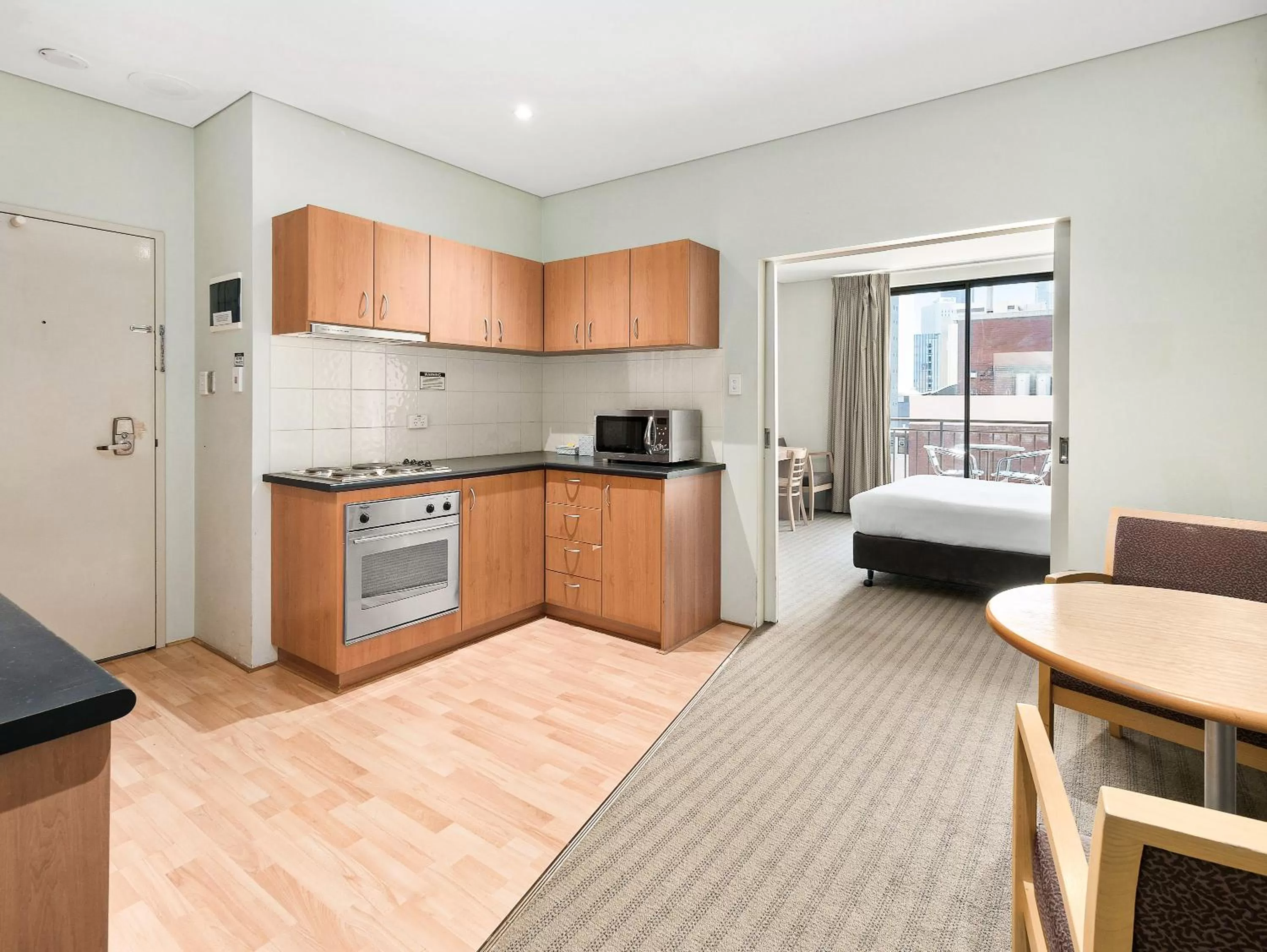 Kitchen or kitchenette, Bed in All Suites Perth