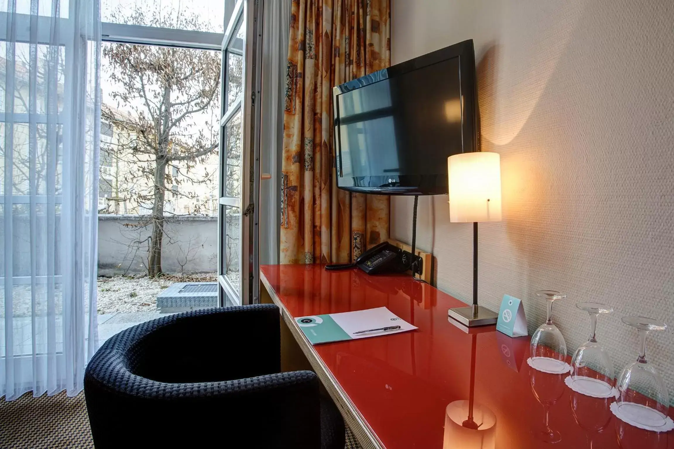 Photo of the whole room, TV/Entertainment Center in Centro Hotel Nürnberg