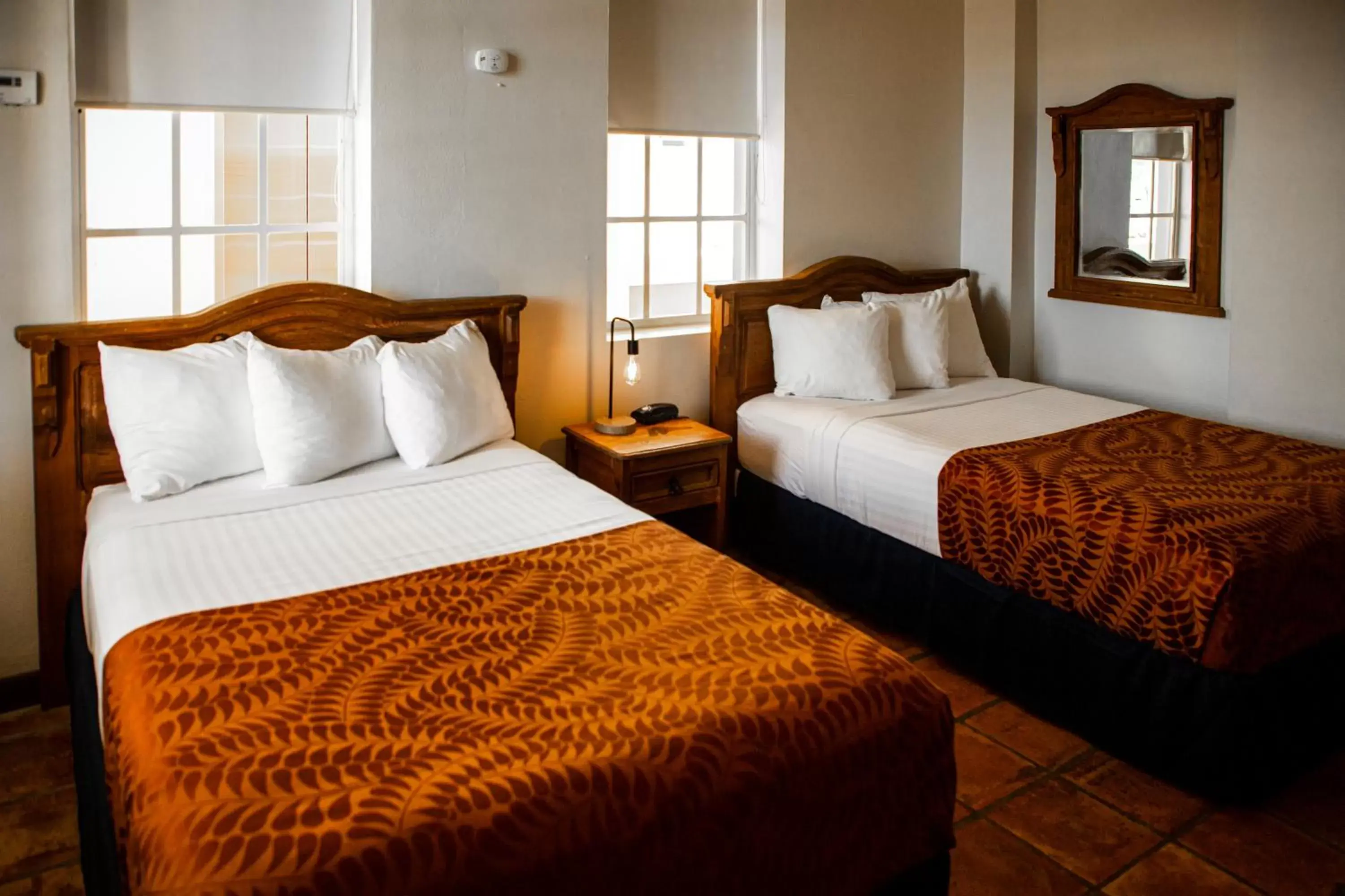 Bed in Mayaguez Plaza Hotel; SureStay Collection by Best Western