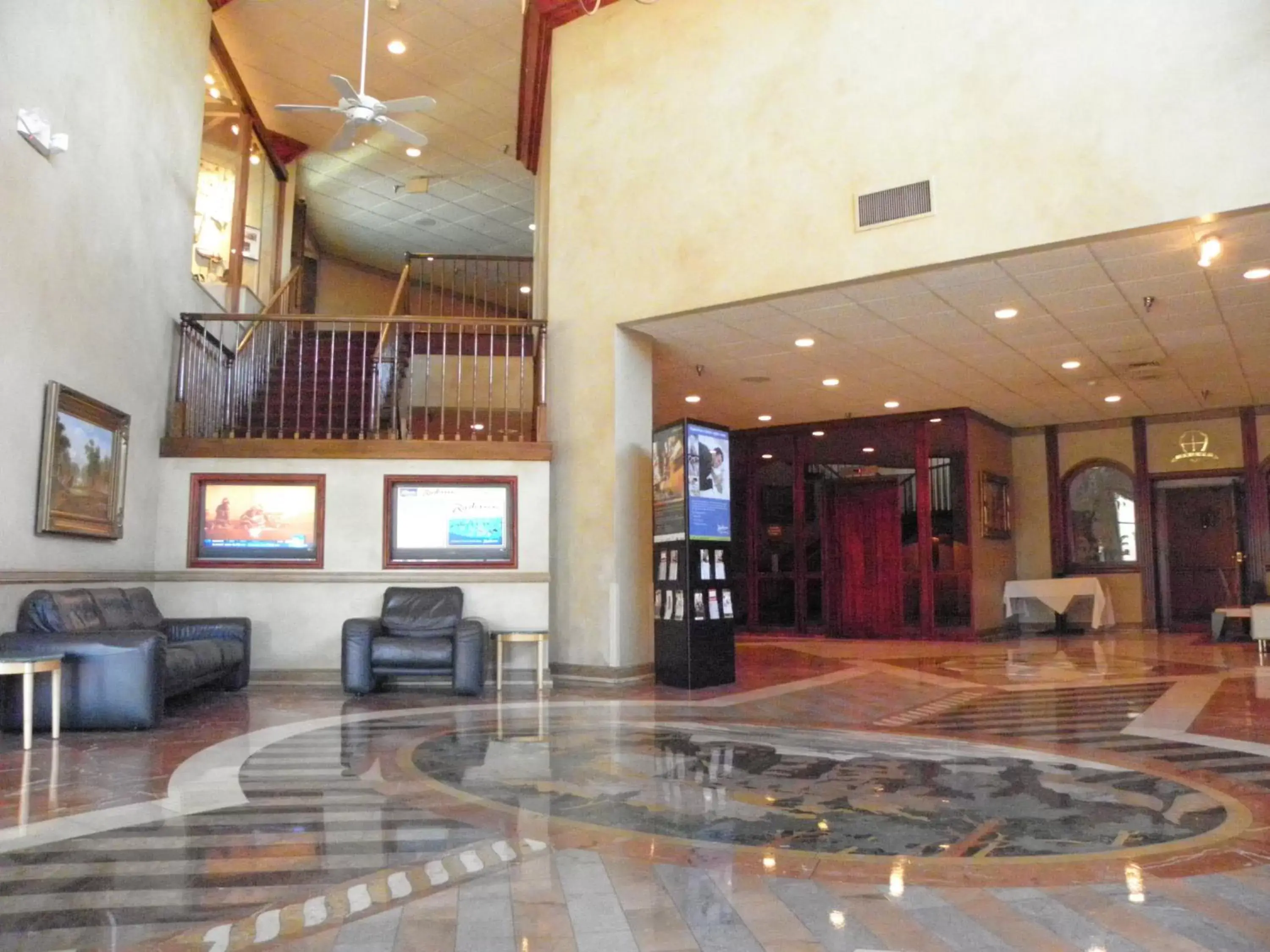 Lobby or reception in The Rushmore Hotel & Suites; BW Premier Collection