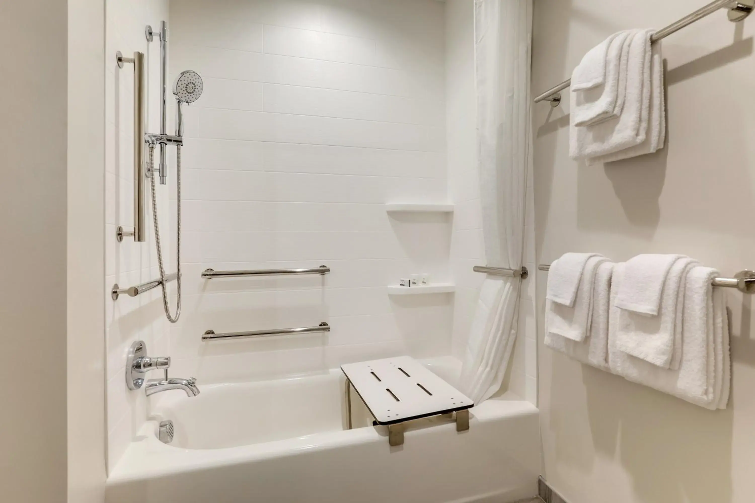 Bedroom, Bathroom in Holiday Inn Express Holly Springs - Raleigh Area, an IHG Hotel
