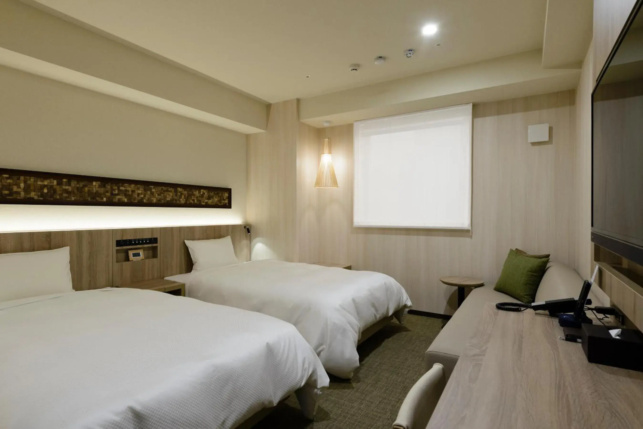 Bed in Hotel Il Fiore Kasai Bed in Hotel Il Fiore Kasai