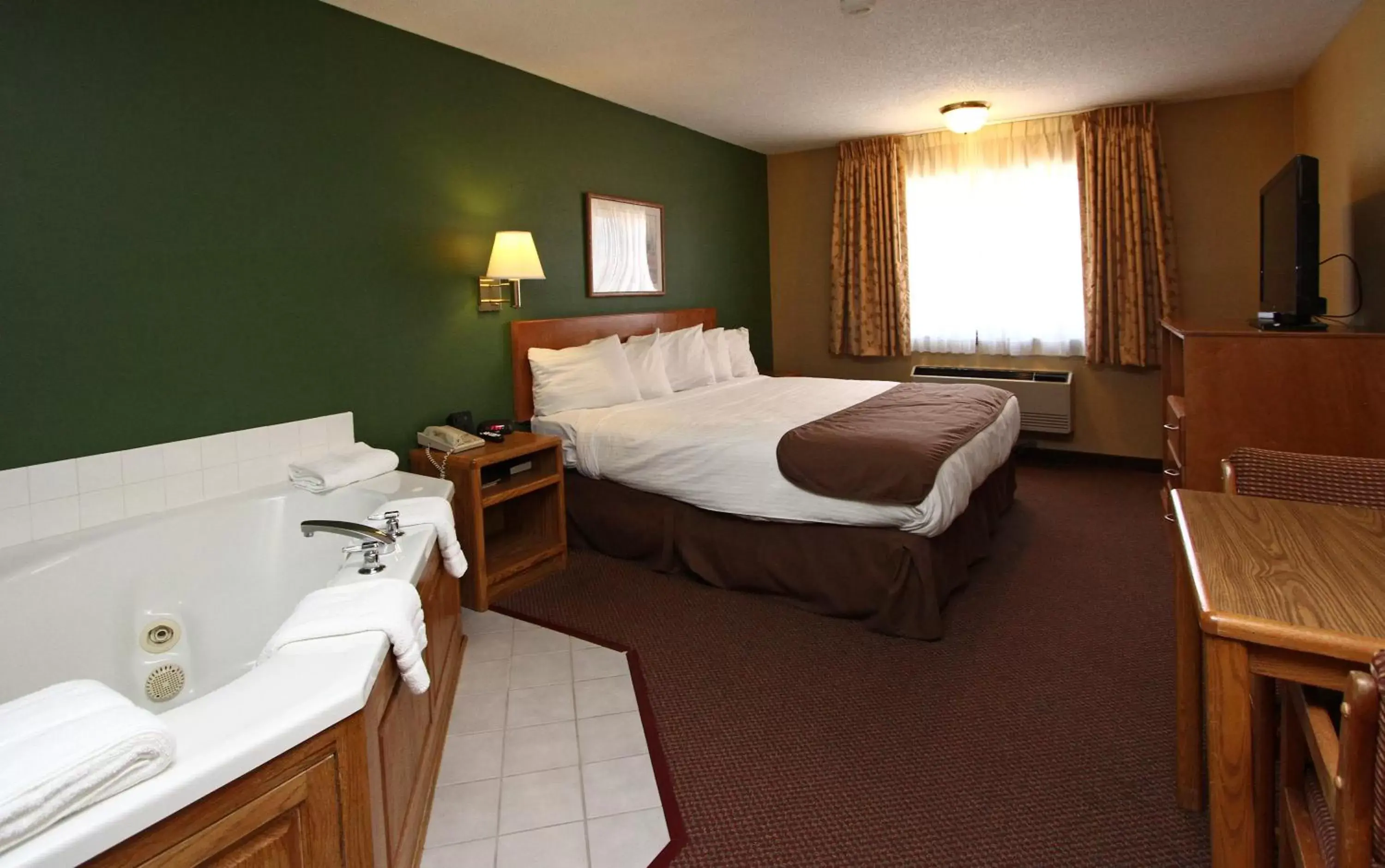 Bedroom, Bed in New Victorian Inn & Suites Kearney