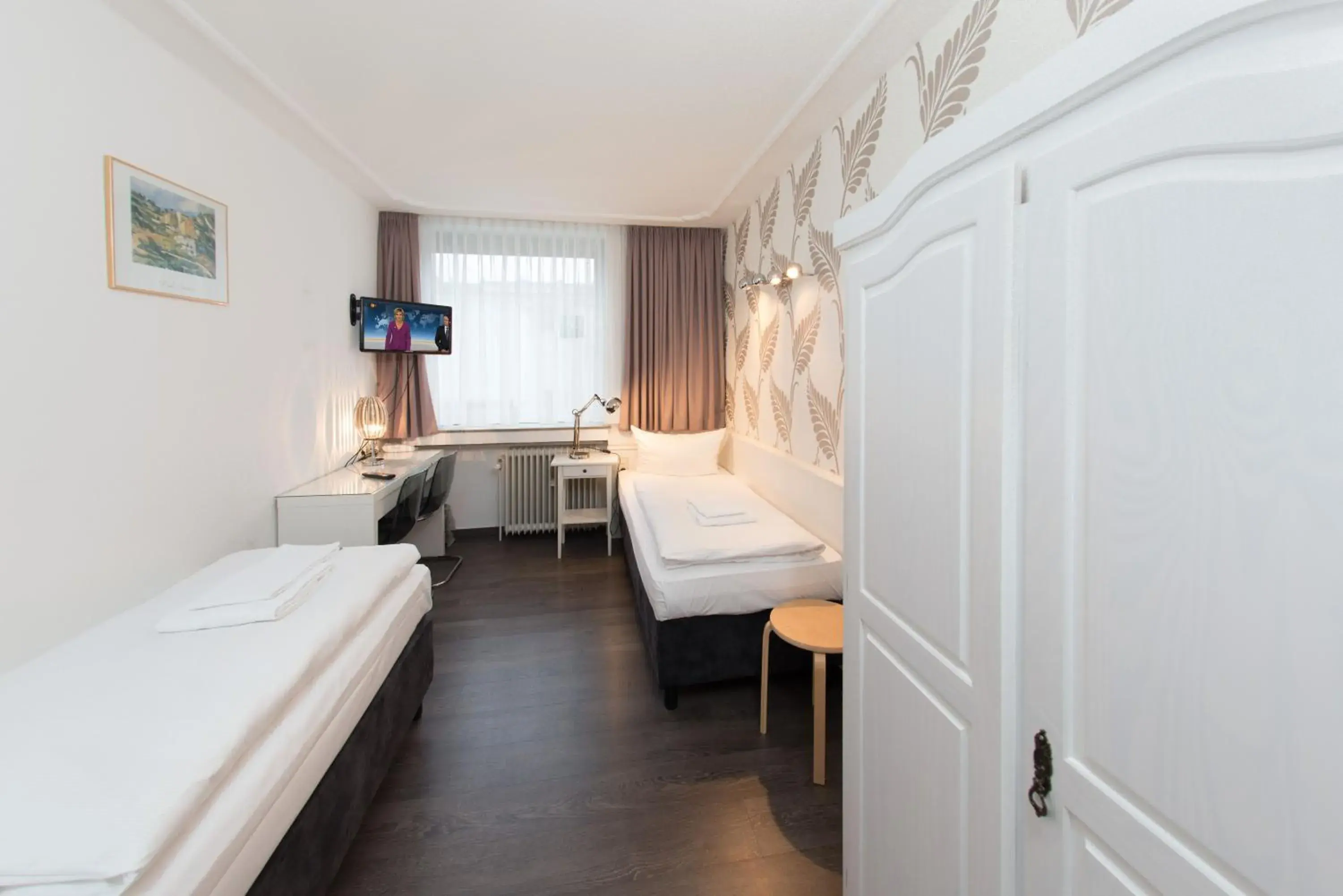 Bed in Hotel Krone Aachen | City-Eurogress