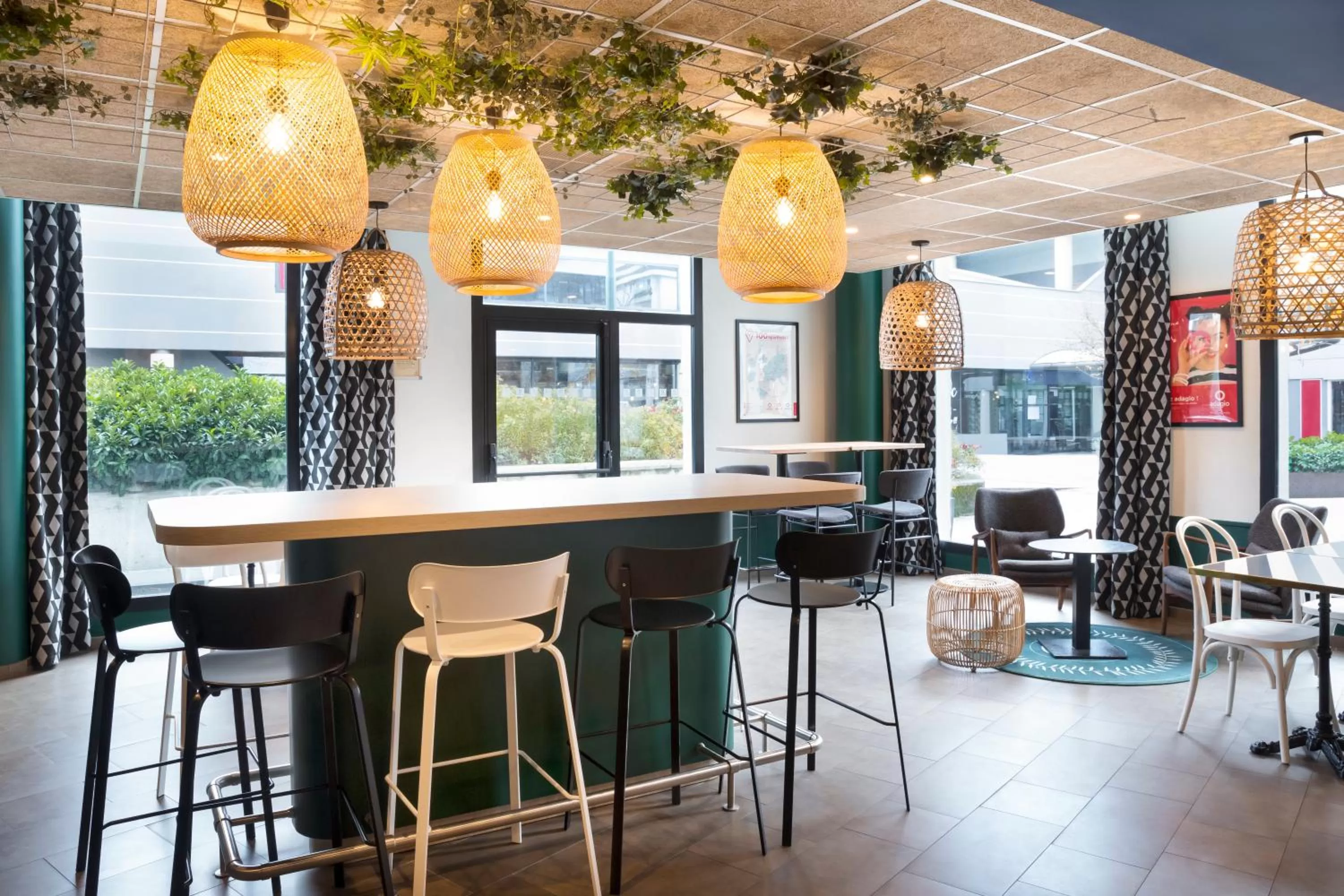 Communal lounge/ TV room in Aparthotel Adagio Annecy Centre