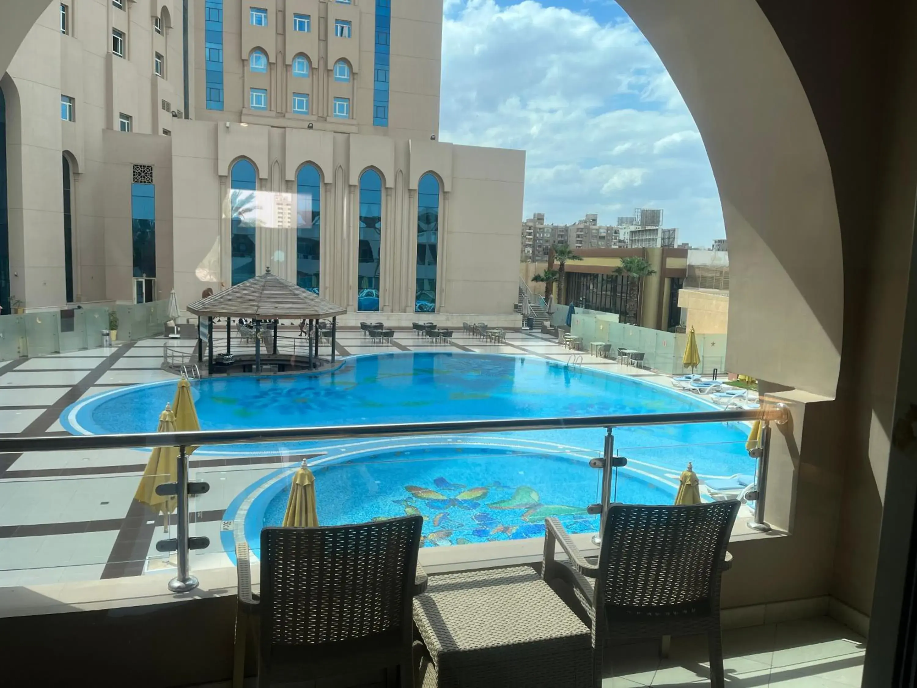 Balcony/Terrace, Swimming Pool in Tolip Golden Plaza