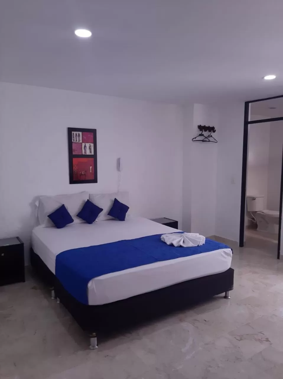 Bed in Blue Star Hotel