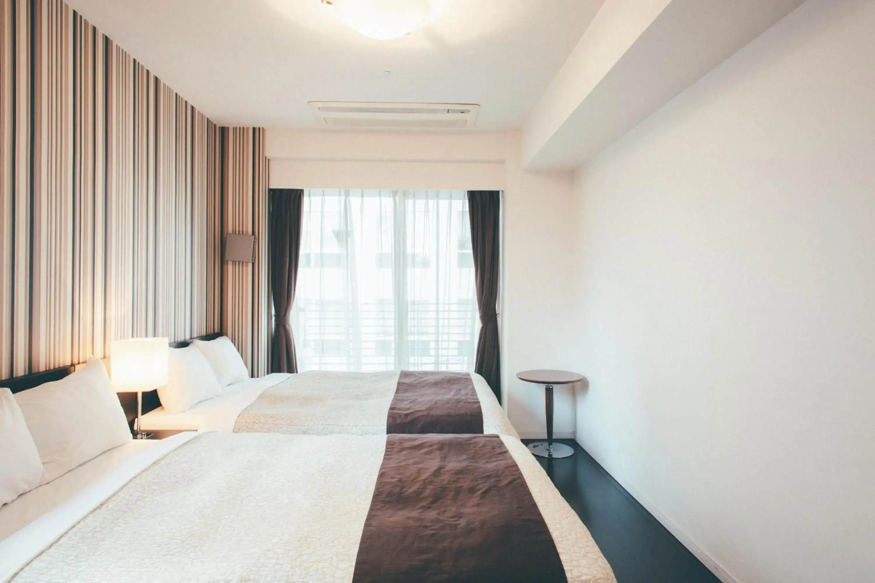 Bed in Kuretake Inn Premium Hamamatsucho