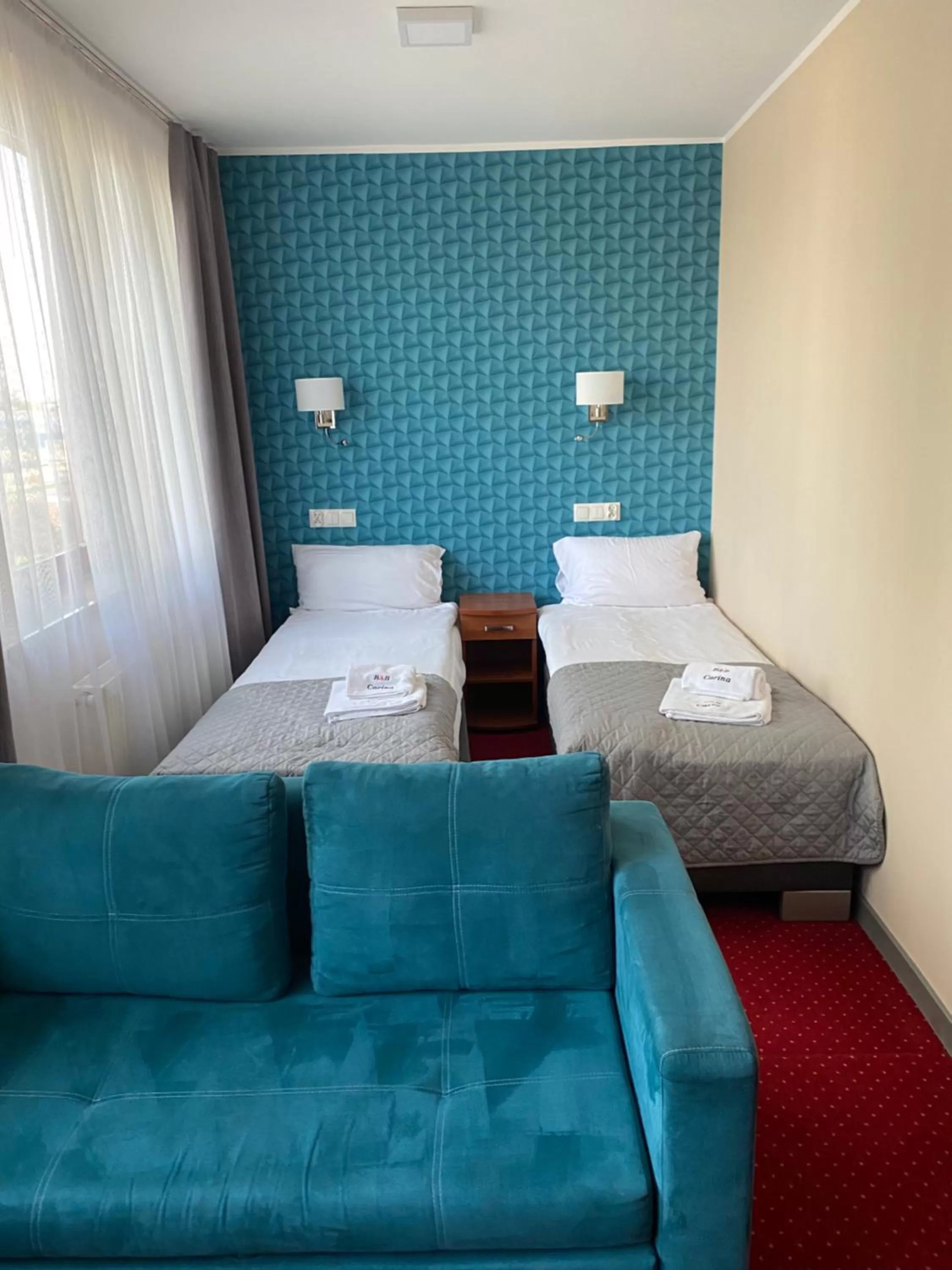 Photo of the whole room, Bed in Carina Hotel