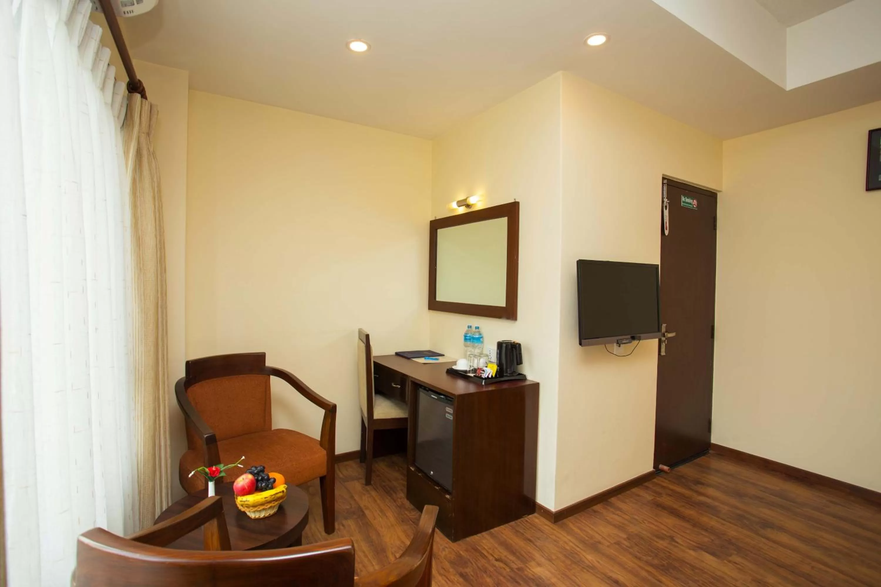 Seating area in Hotel Jay Suites