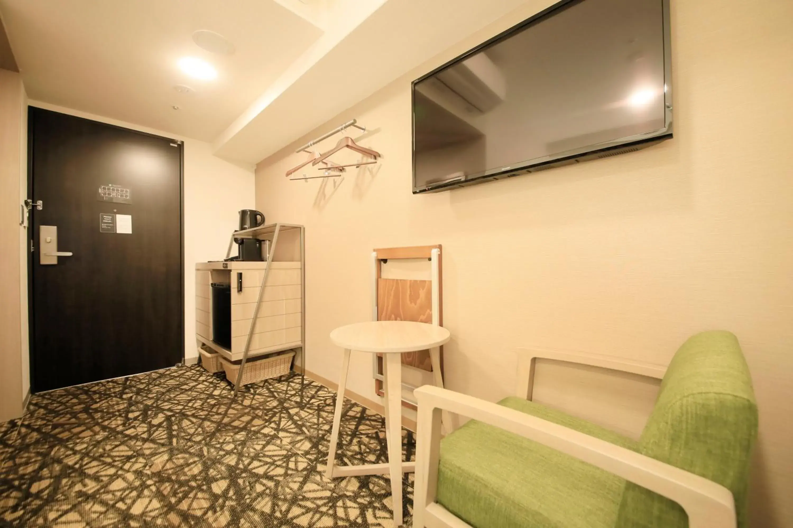 Photo of the whole room, TV/Entertainment Center in S-peria Inn Osaka Hommachi