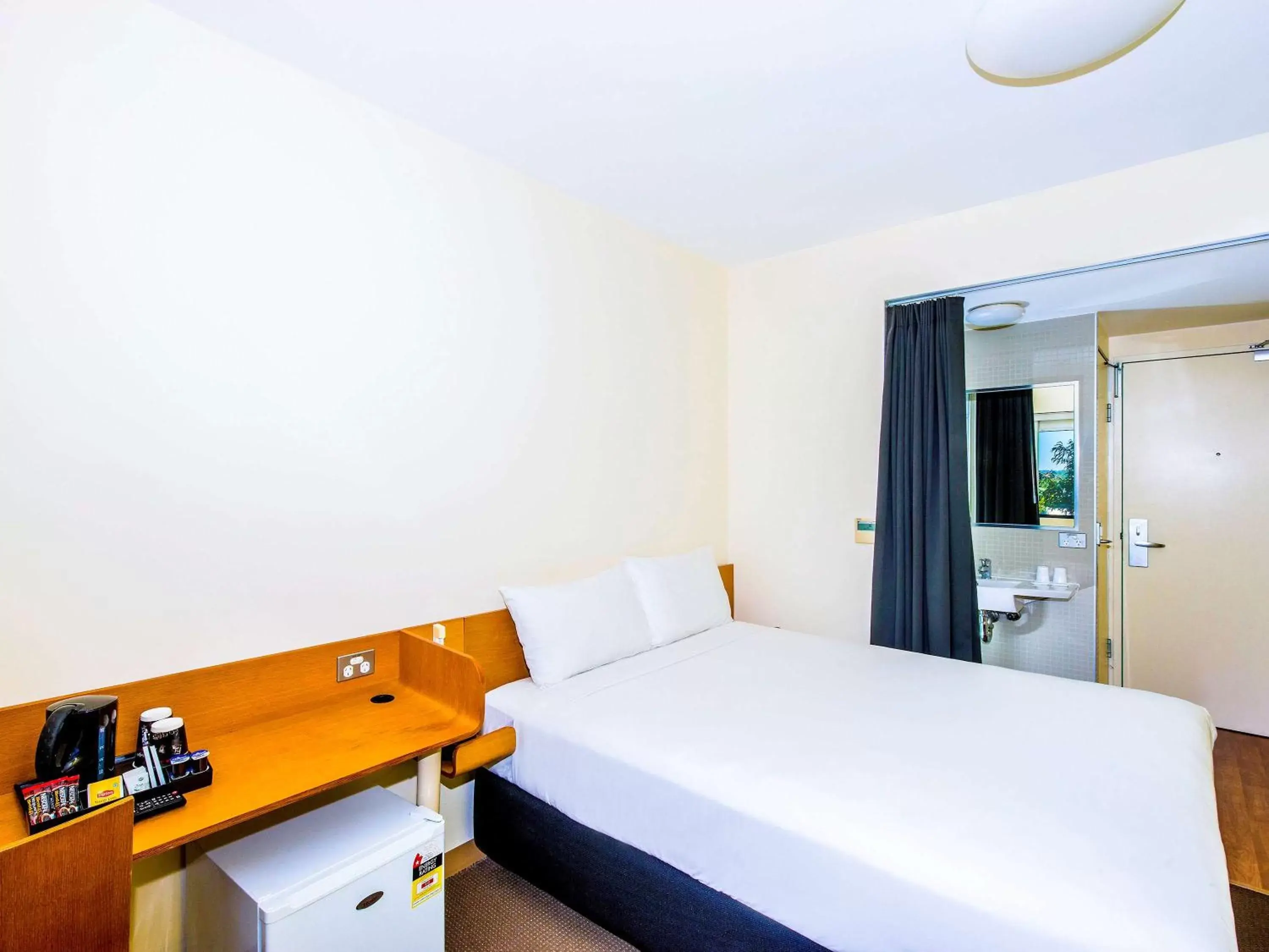 Photo of the whole room, Bed in ibis Budget Sydney Olympic Park