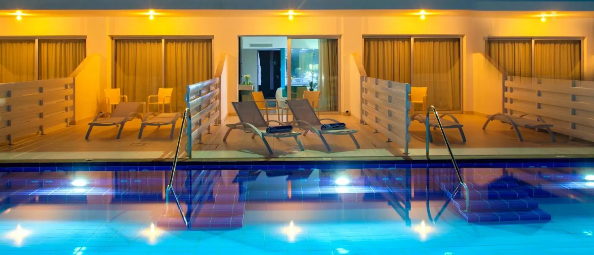 Balcony/Terrace, Swimming Pool in King Evelthon Beach Hotel & Resort