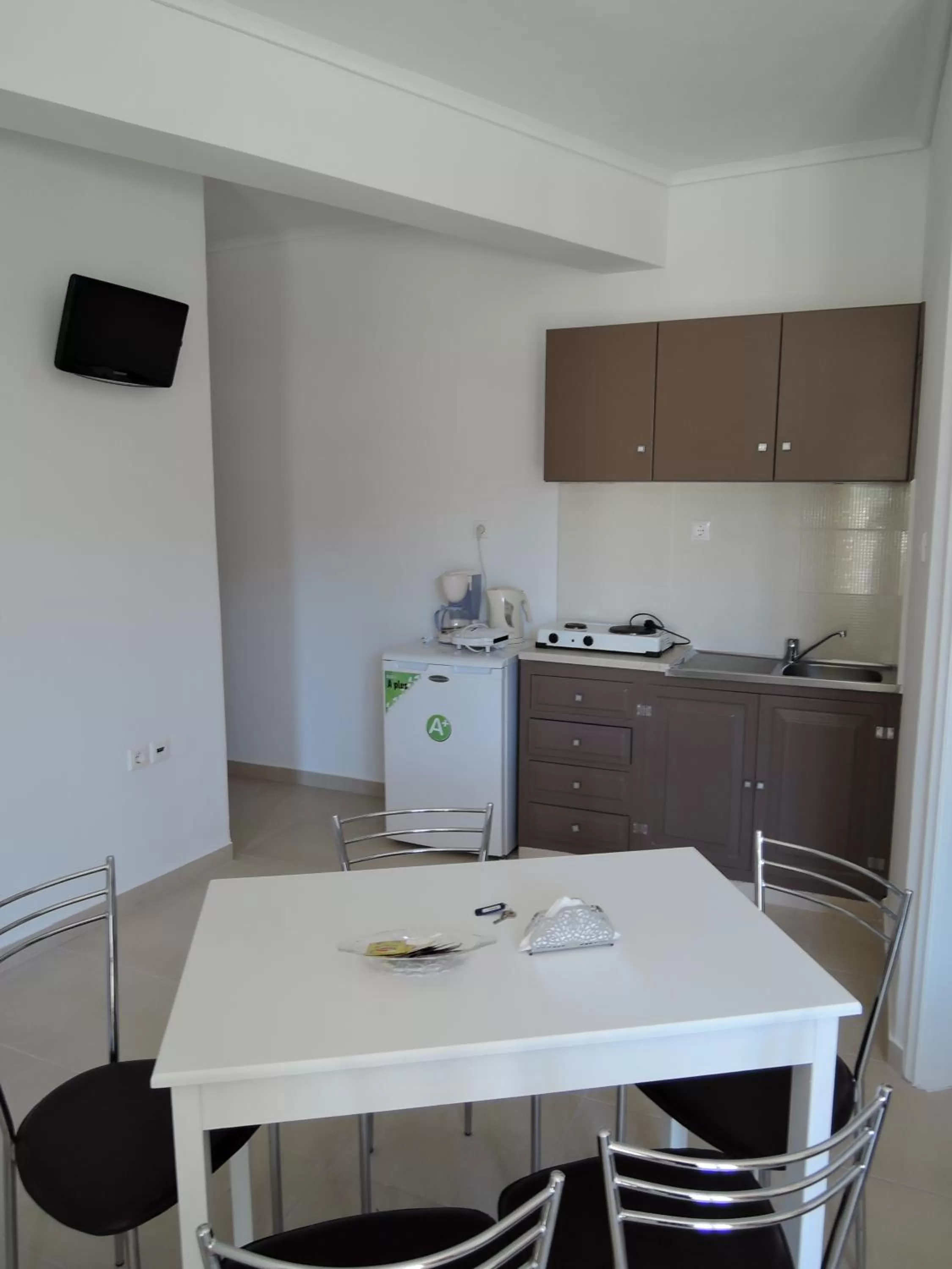 Kitchen or kitchenette in Fantasia Hotel Apartments