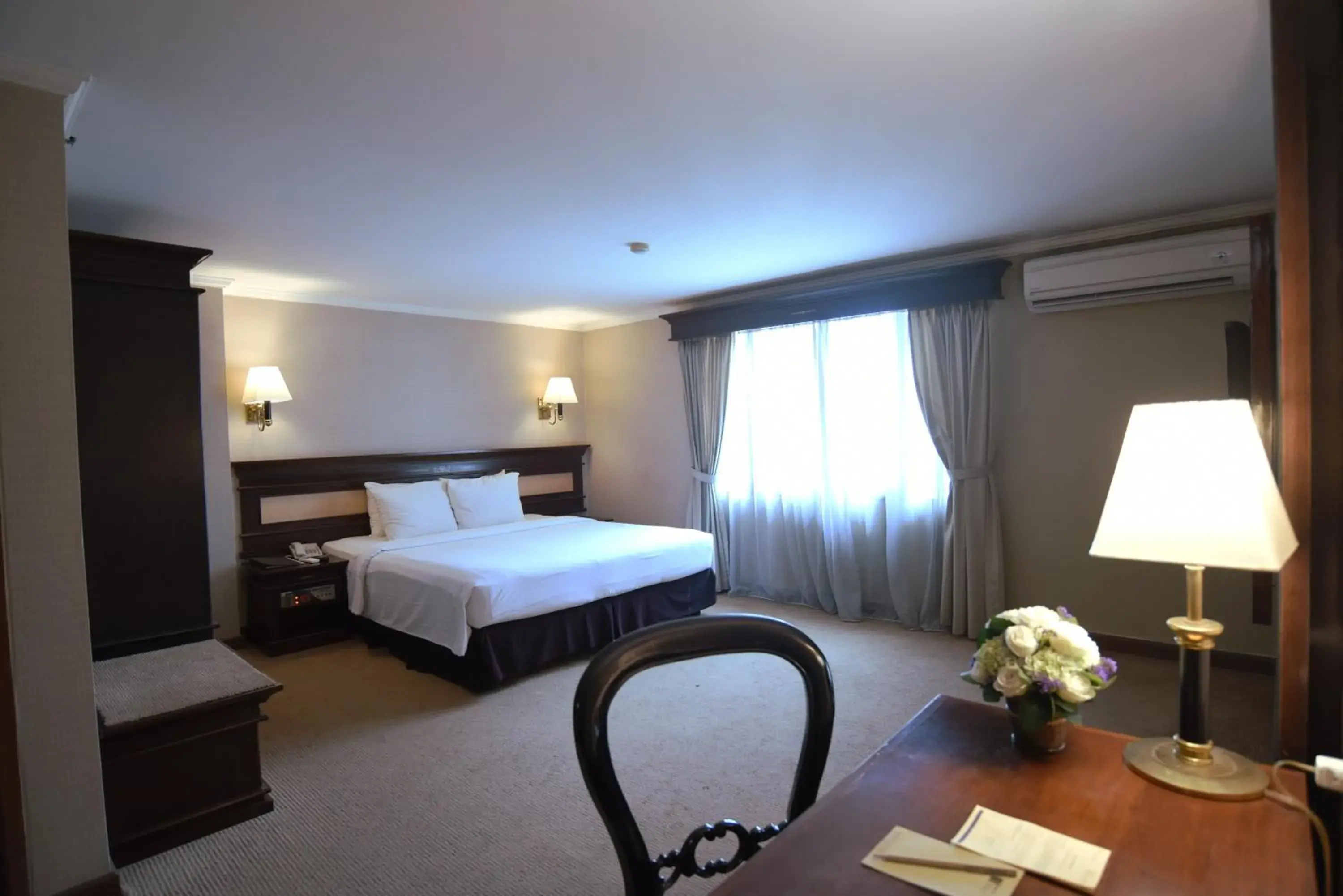 Photo of the whole room, Bed in Mega Anggrek Hotel Jakarta Slipi