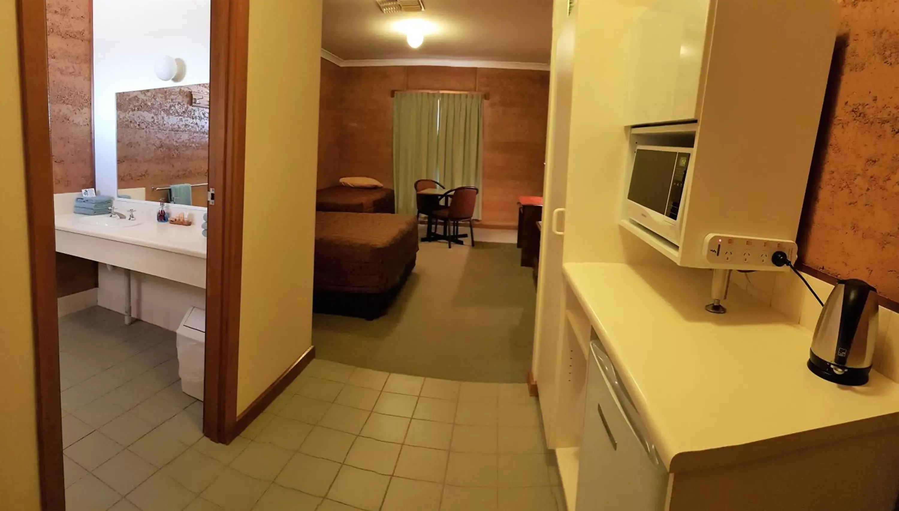 Photo of the whole room, Bathroom in Mud Hut Motel